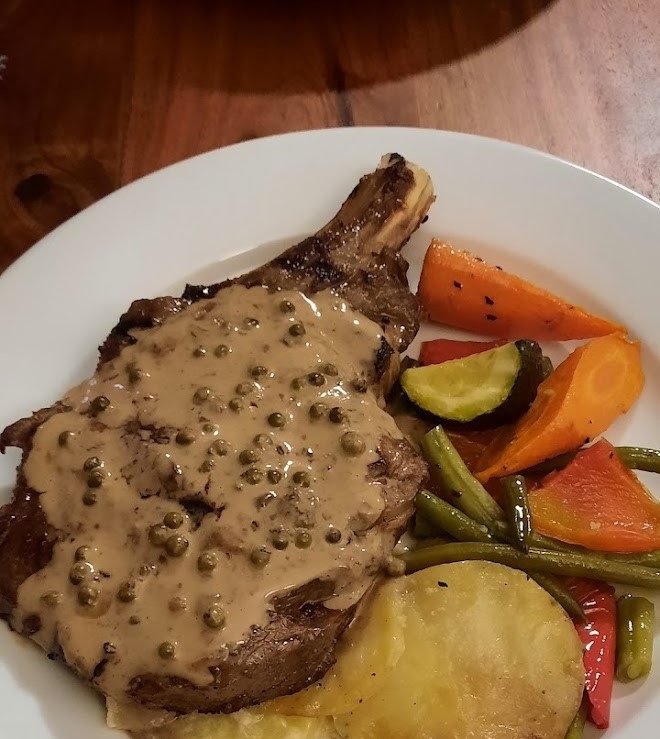 Steak with peppercorn sauce.jpg