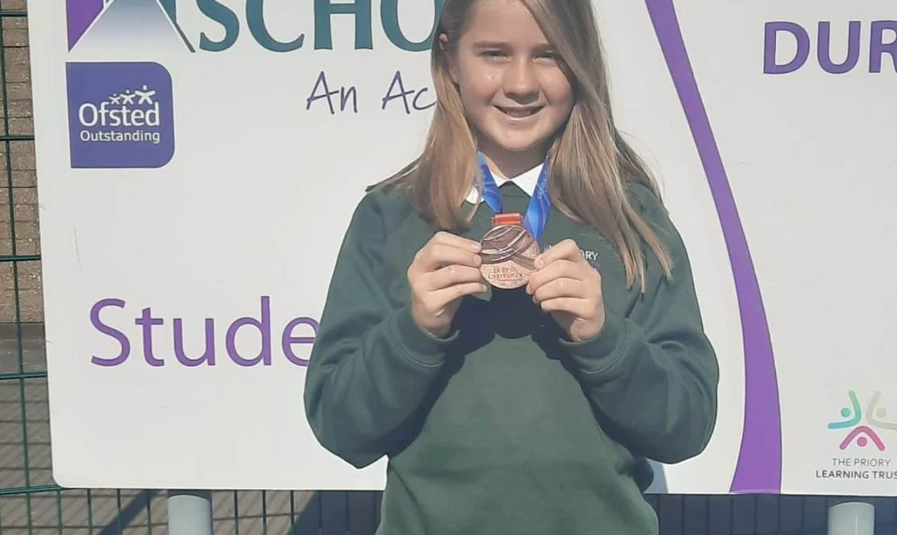 JDNC: Incredible young gymnast wears UK bronze medal with pride