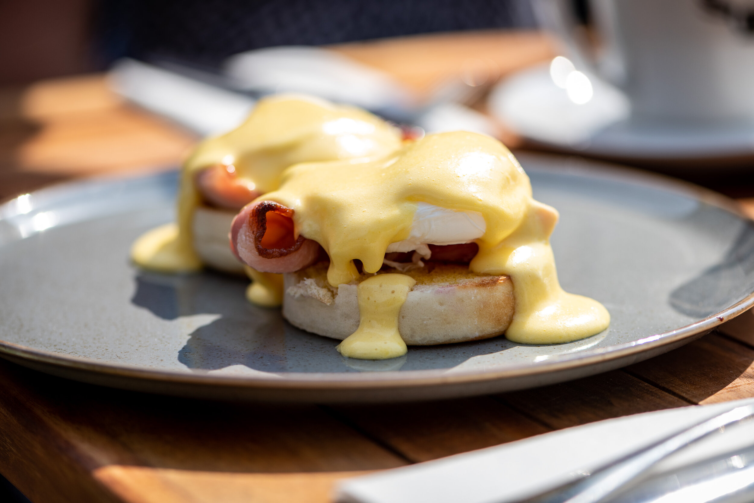 Delicious Breakfast Muffin with Bacon, Poached Egg and Hollandaise