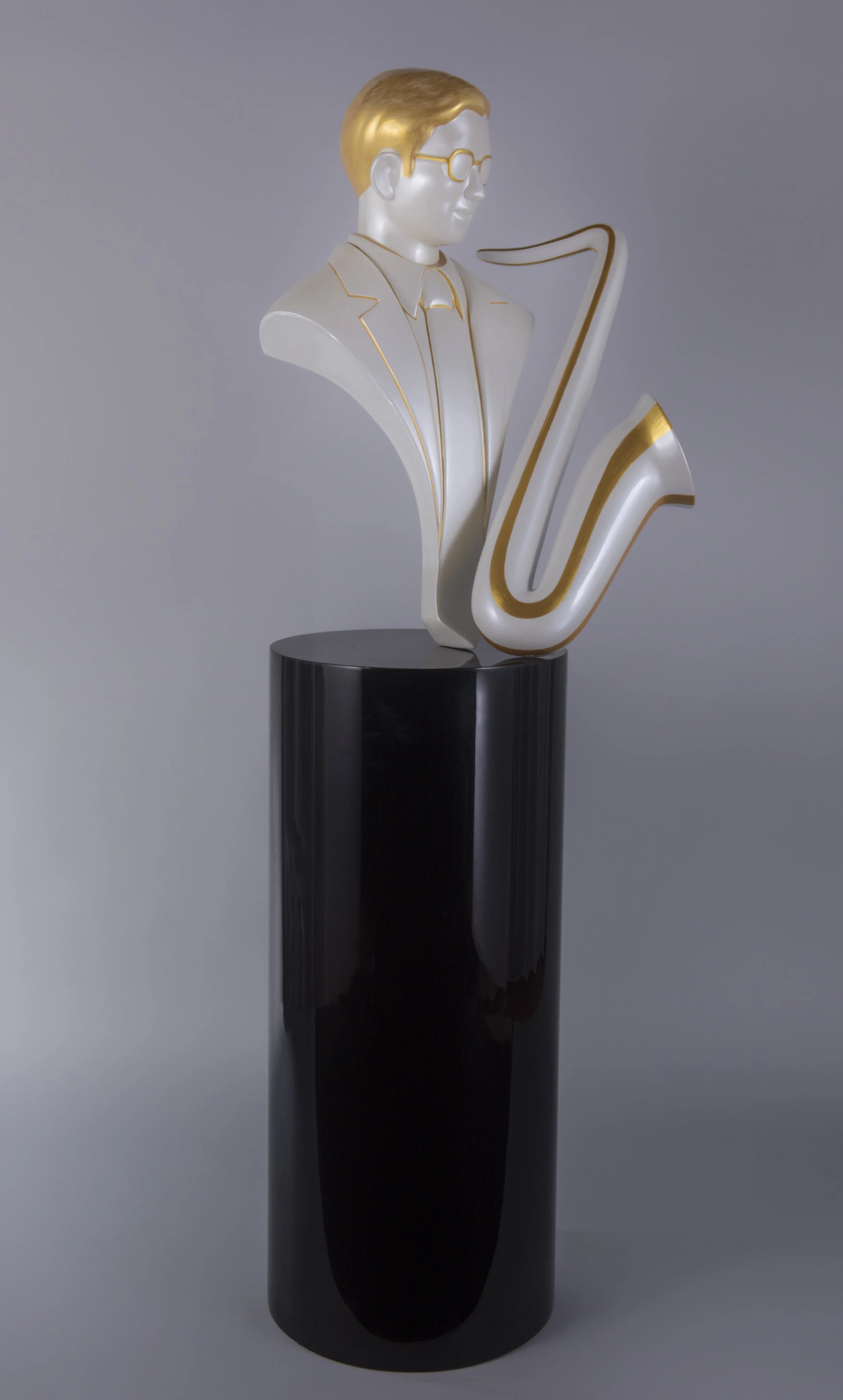 No Moon, King Rama 9 collection: pearl-white pop-art bust with gold hair, gold-rimmed glasses and a gold-edged saxophone, on a black column