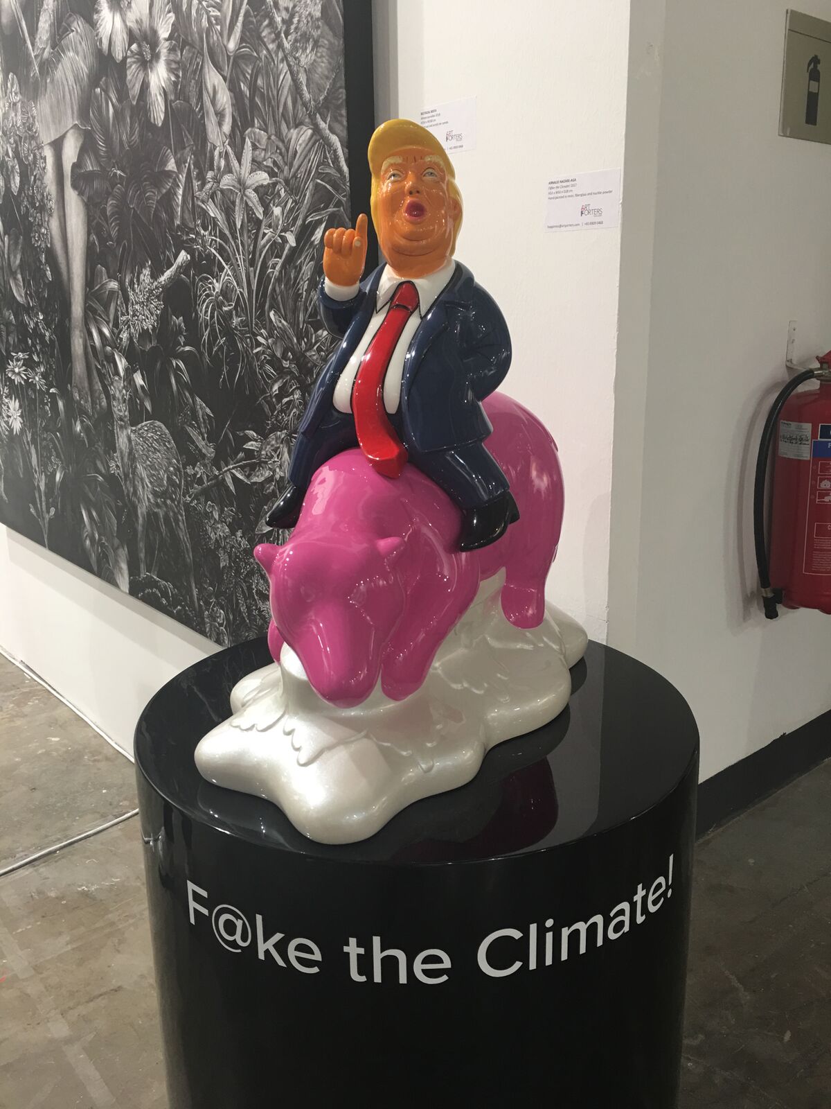 Fake The Climate Arnaud Nazare-Aga Pop Art Trump sculpture on bear Dark Pink Exhibition on stand
