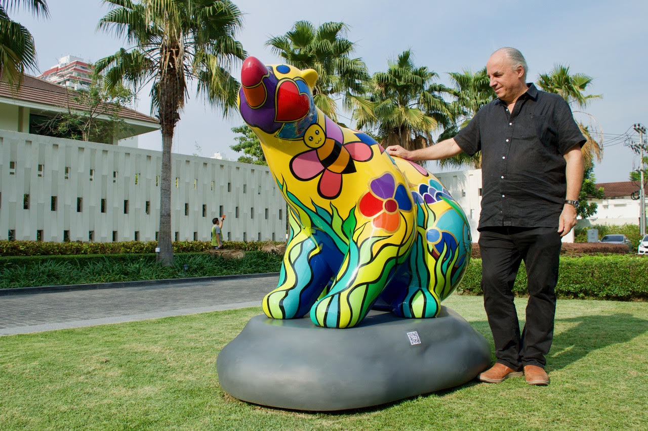 B-Pop Sitting Bear on rock artist Arnaud Nazare-Aga Pop art Bear sculpture Bangkok Hotel on grass