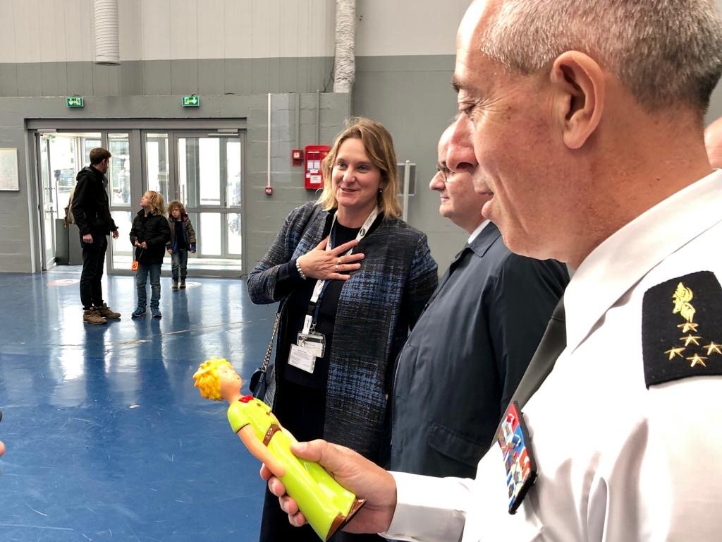 General Philippe Lavigne holding the Little Prince and Anne-Catherine Robert-Hauglustaine, Director of the Air &amp; Space Museum