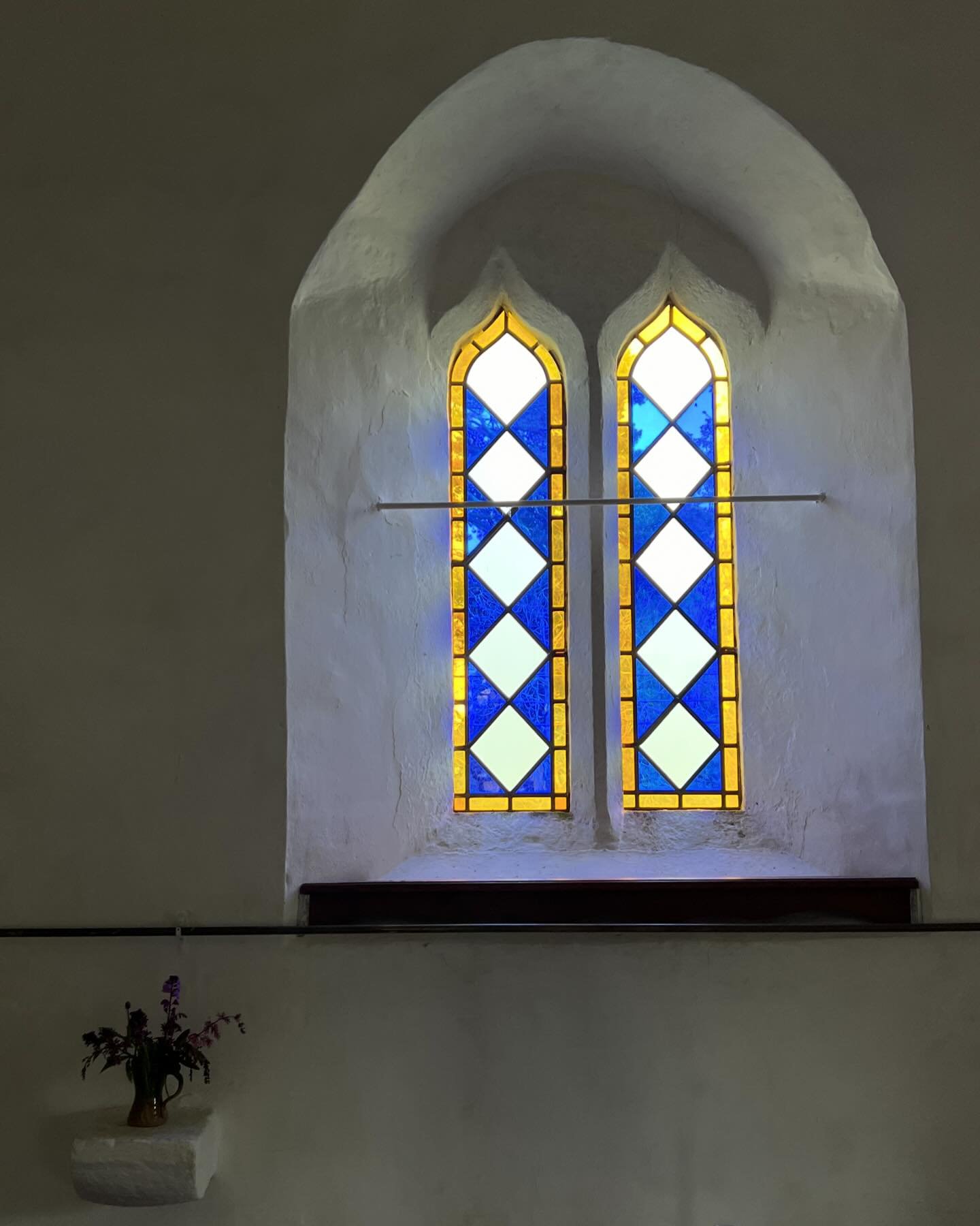When I made stained glass panels and windows I loved layering, complex intriguing patterns and playing with and on abstract/ figurative images. However, one of my favorite windows remains this - a simple geometric window in my local church at Aylton.