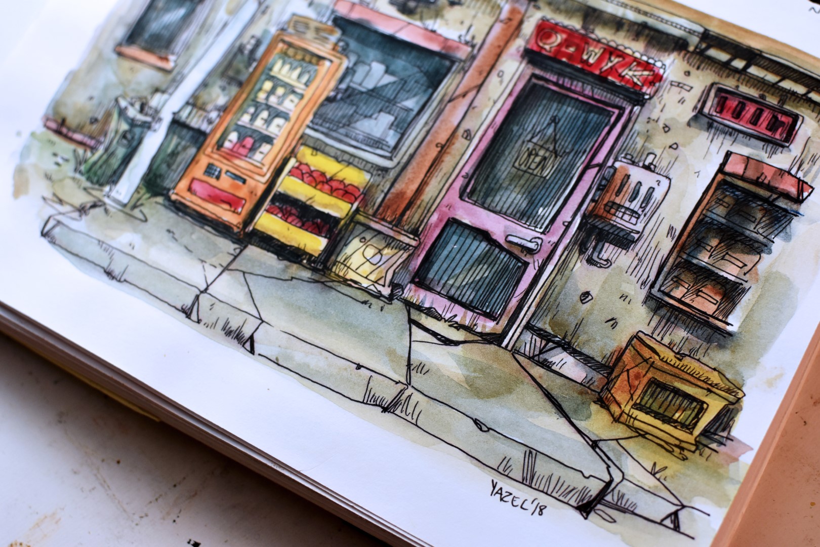 Halfway through the painting process, you can see here I’ve left a few elements untouched. After this dries I add a bit more contrast in the shadows and apply the final light washes.