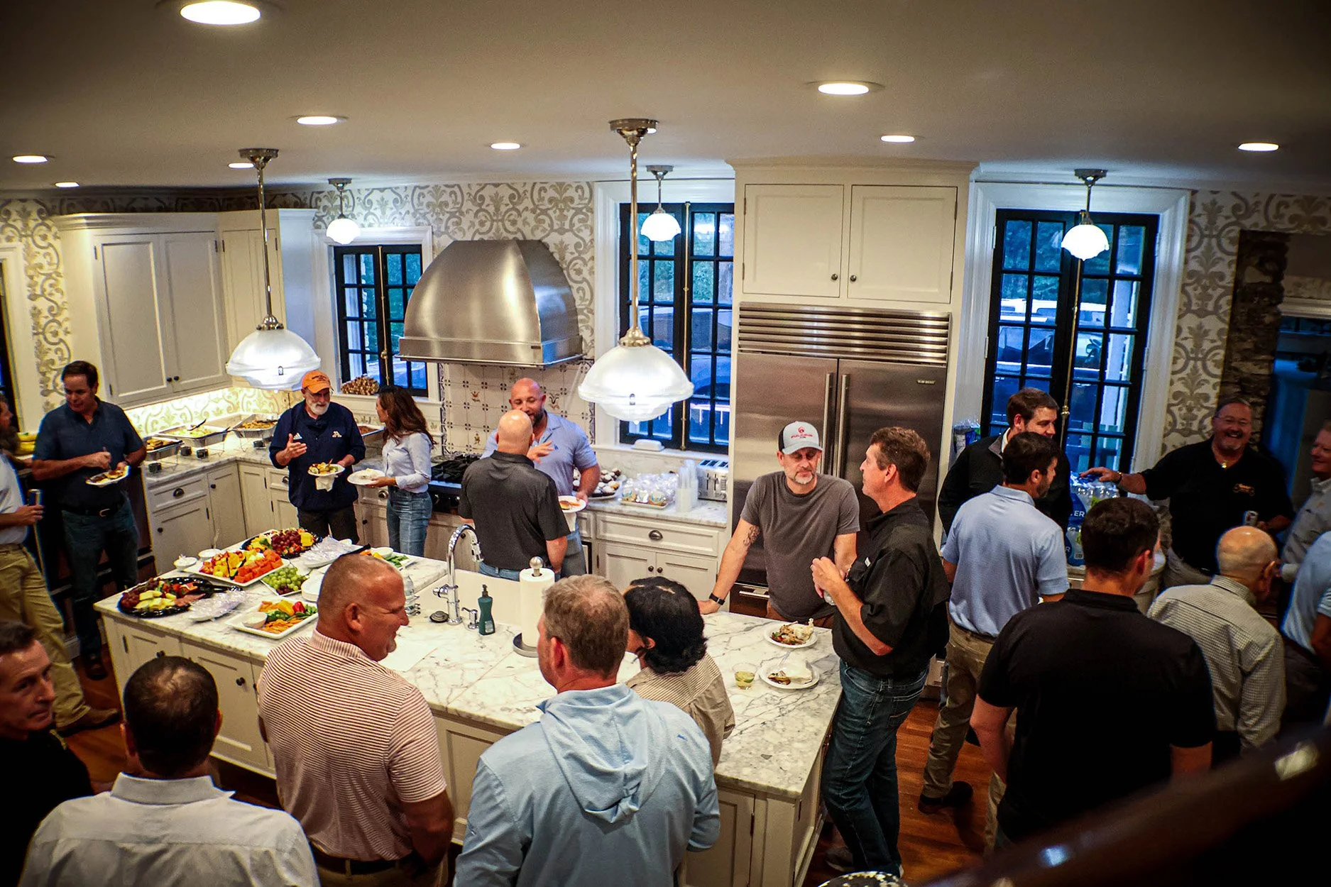 A gathering of friends, colleagues, and customers at USA's pre-party for the 2025 Utility Expo