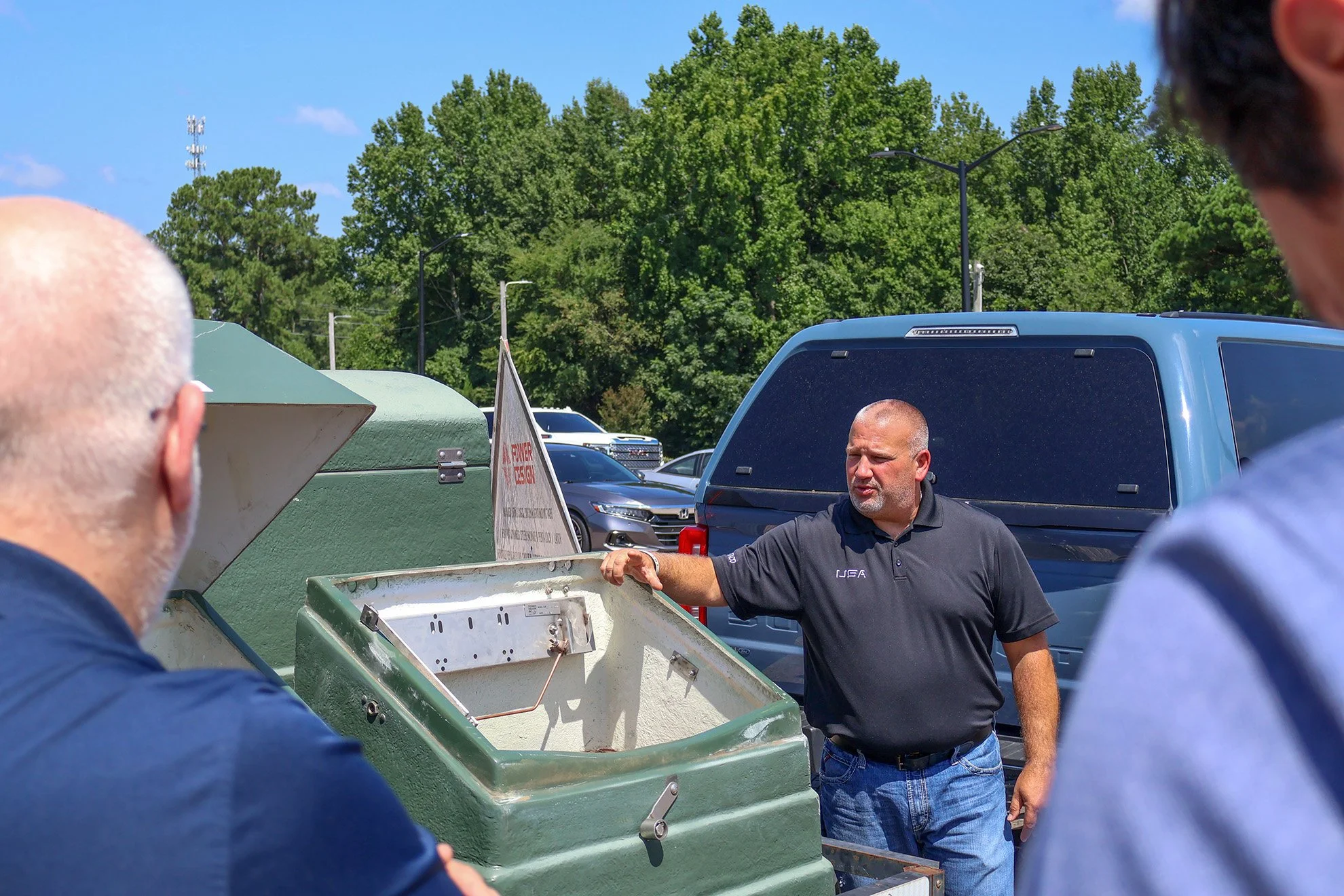 Chris Rush hosts a training and demonstration of Power Design fiberglass cabinets for USA employees
