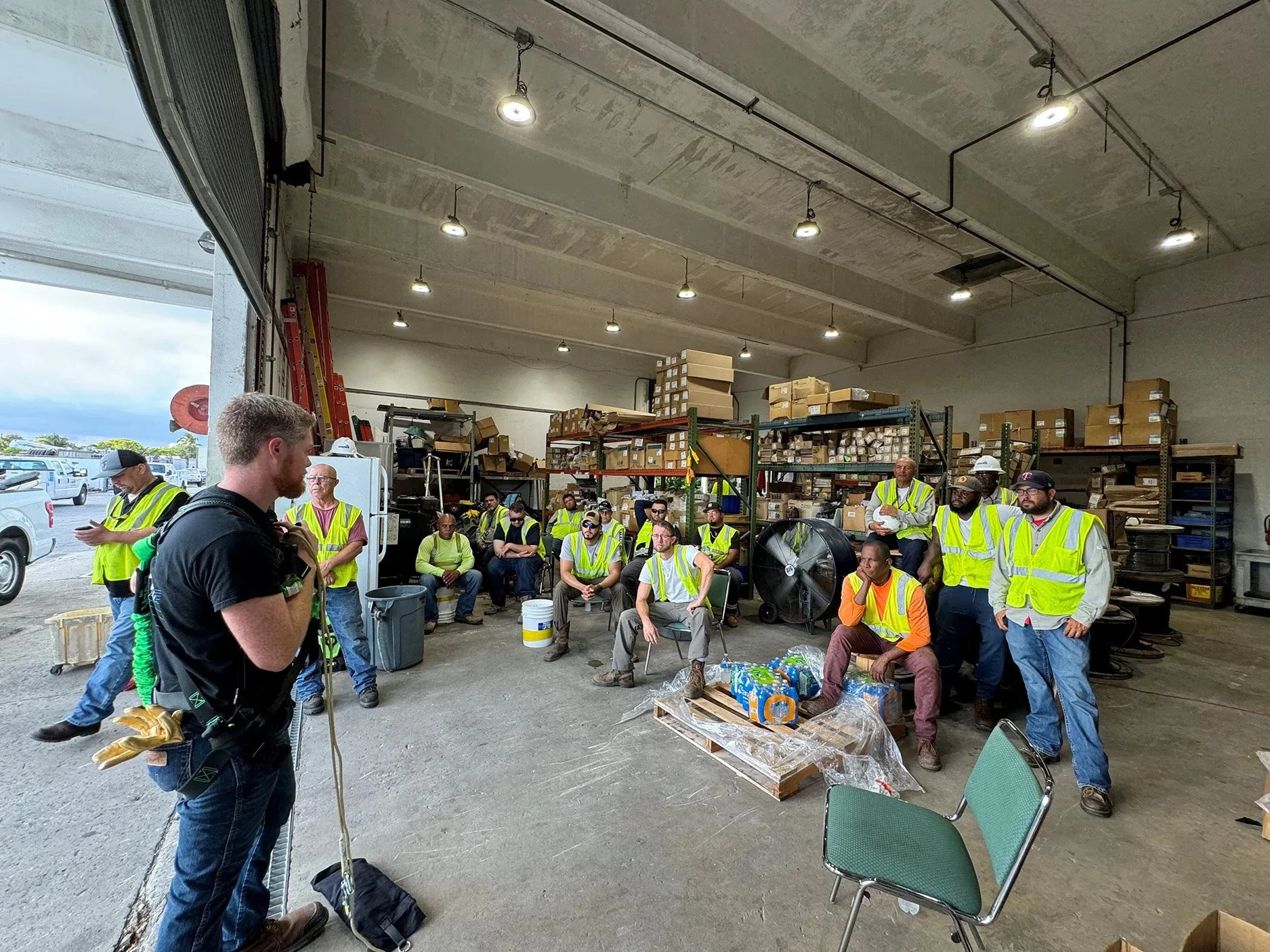 Jonathan Singleton demonstrating the proper use of Buckingham’s ‘Bucket Self Rescue’ kit with a utility contractor in Florida