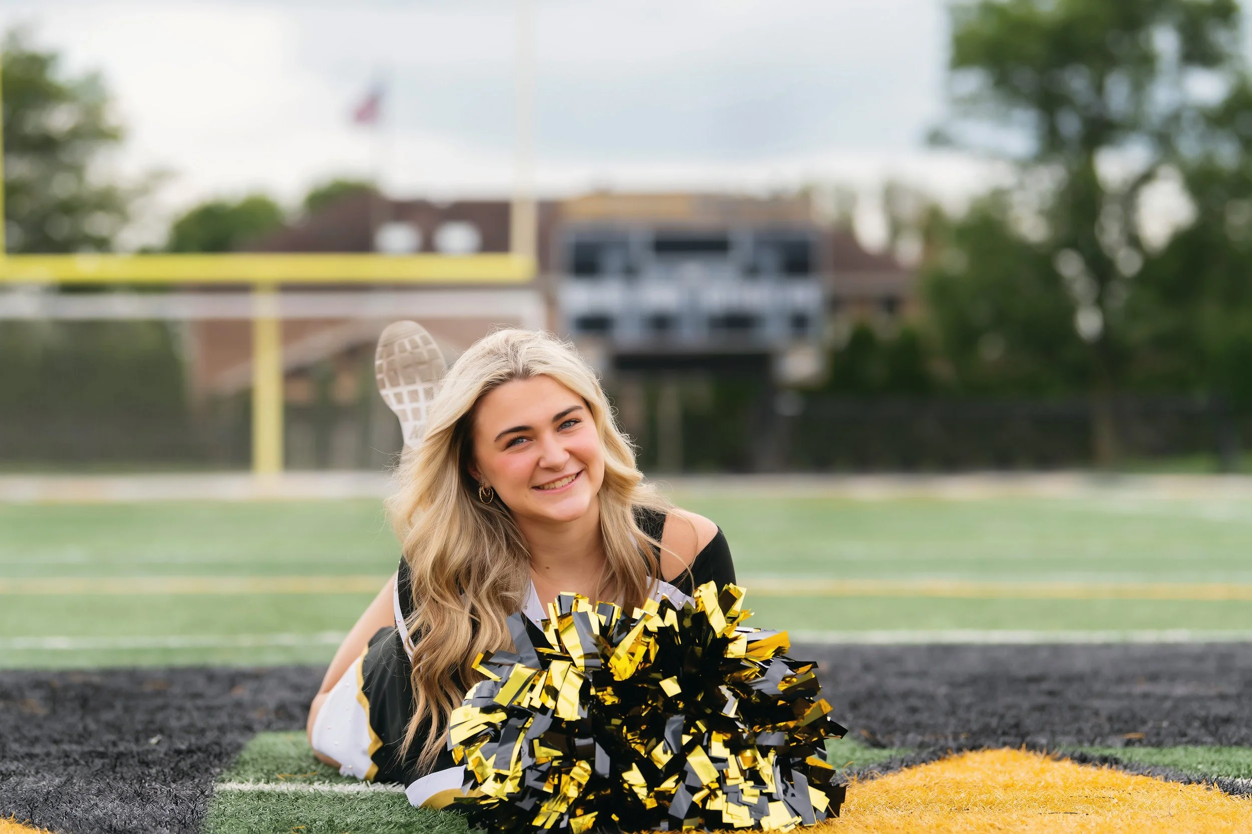 Senior pictures on the football field Andrew High School.jpg