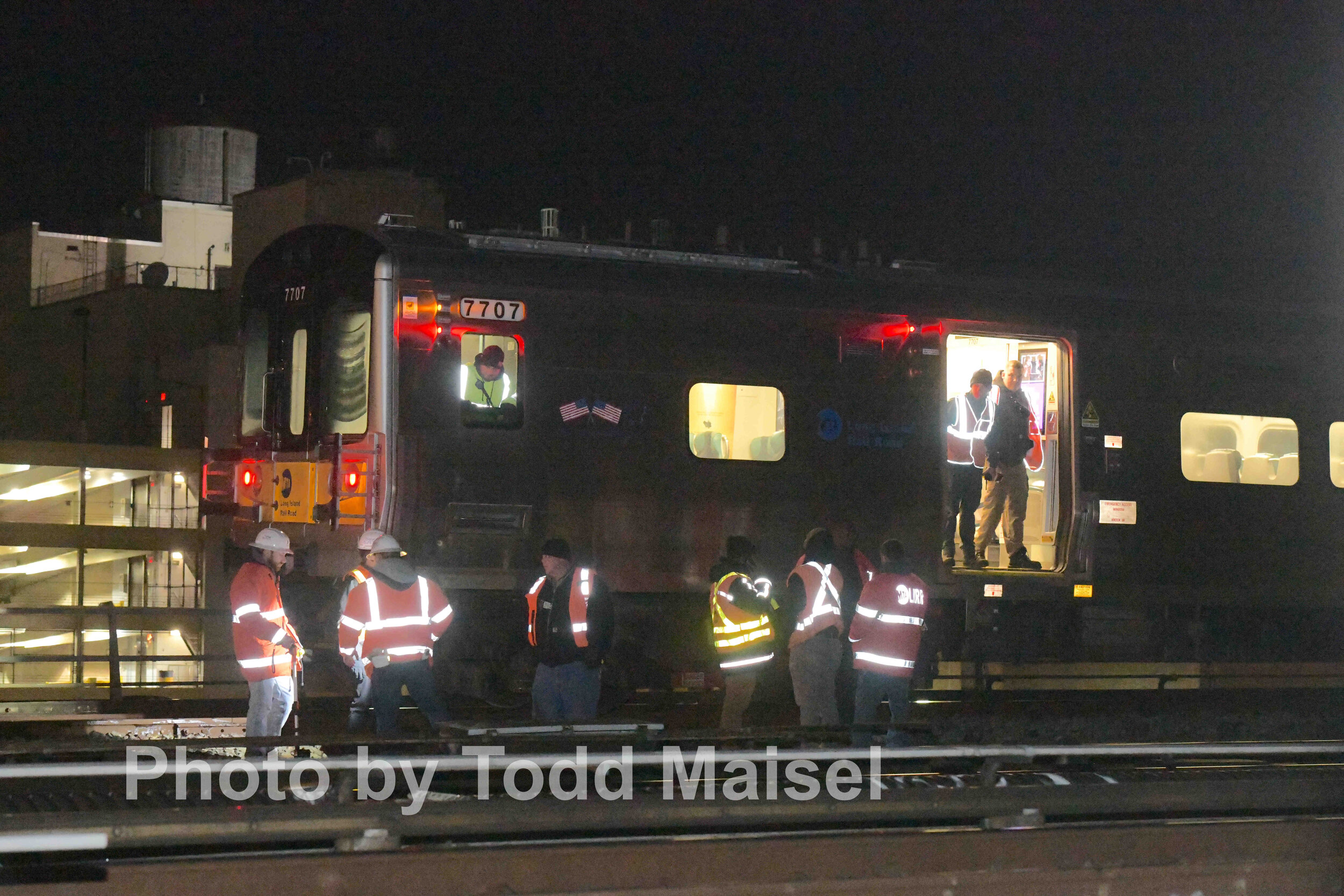  Long Island Railroad workers try to figure out why their train heading into the Jamaica Avenue station derailed a quarter mile before the station Nov. 23, 2019 