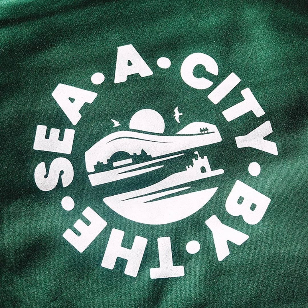 a-city-by-the-sea-logo-tote-close-up-sq.jpg