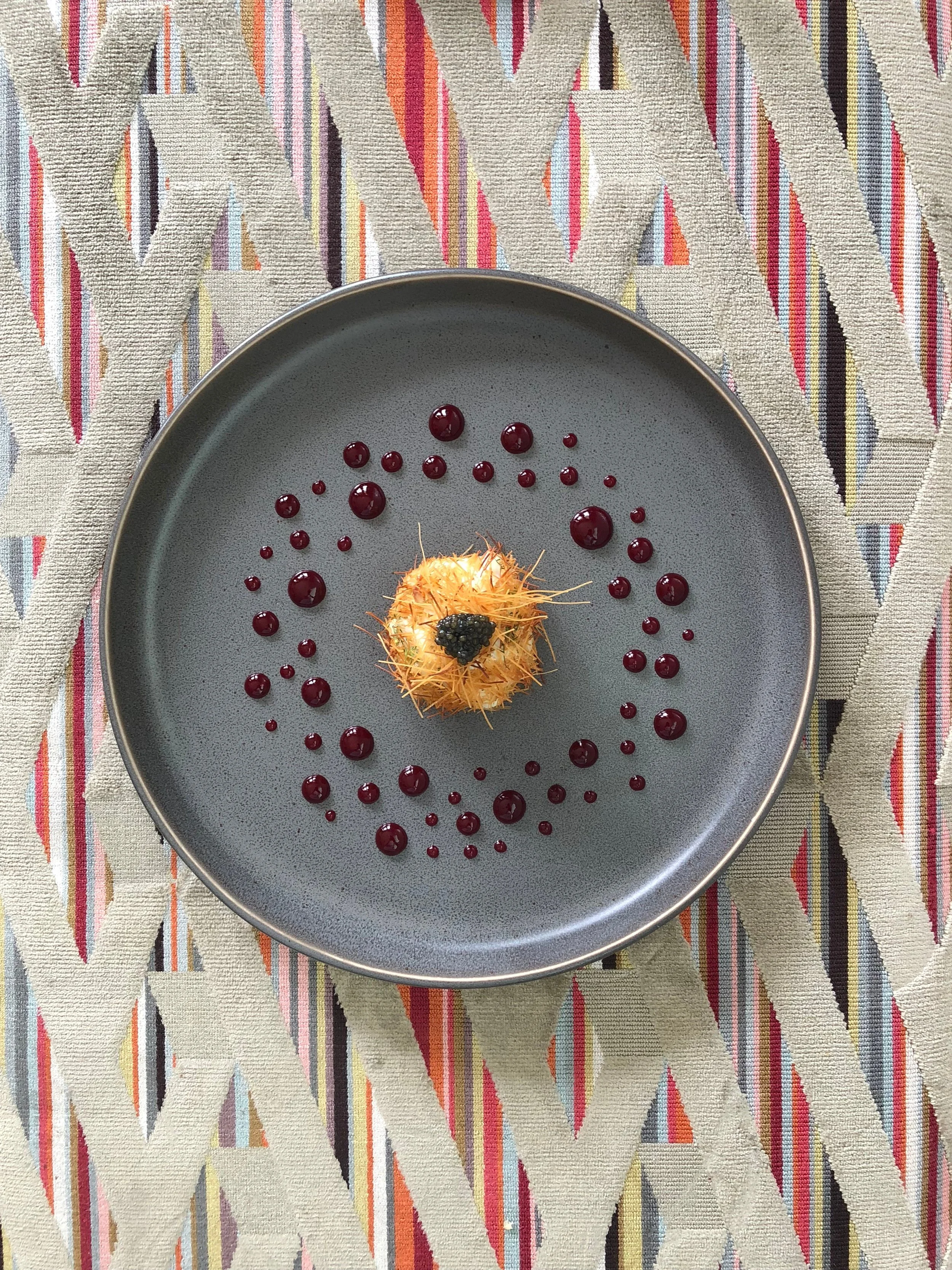 Crab Crostillant with Raspberry Sauce: "This is the first dish of hers that I fell in love with. I couldn't believe the flavors would work together. Such a mind bending combination that is just so Raji.” - Erling Jensen Photograph by Meredith Gardner