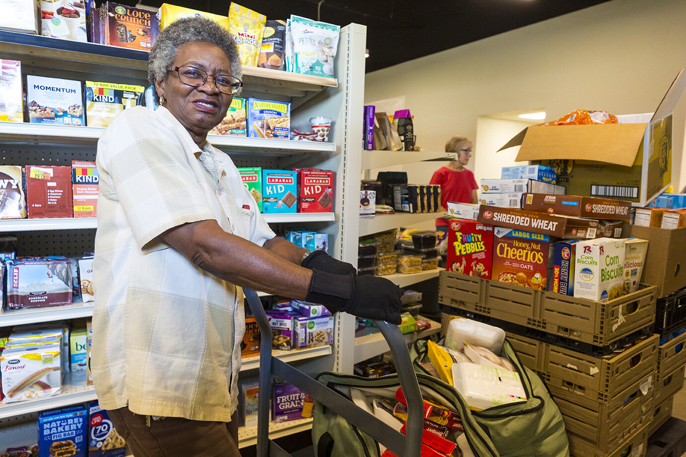 Dorothy Prewitt waits in line to check out items from the Agency Mart in the Mid-South Food Bank