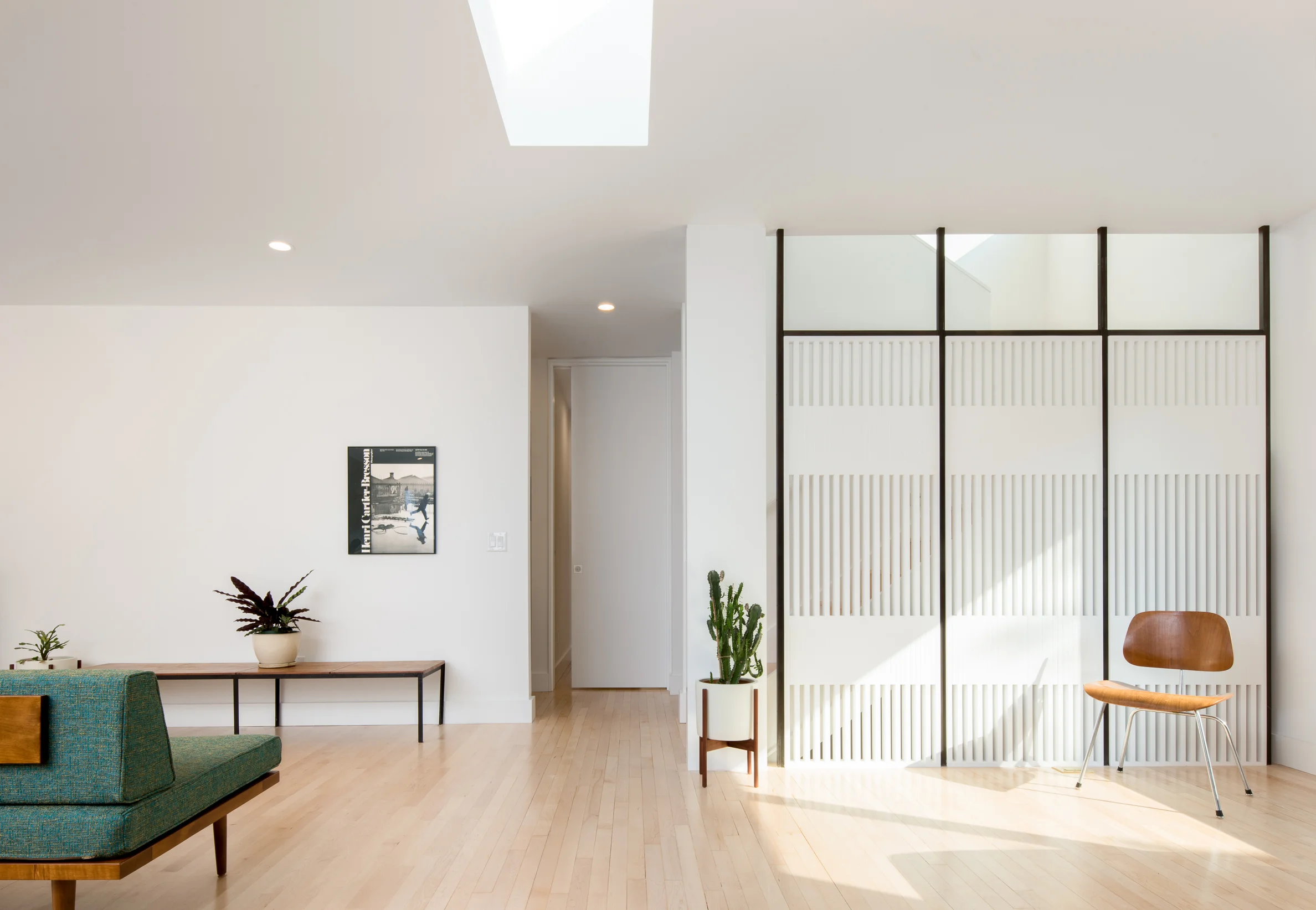 Mid-century home remodel with custom wood screen wall in Minneapolis