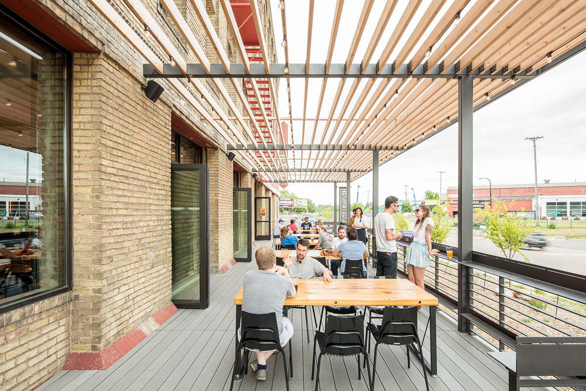 Custom steel and wood pergola on Headflyer Brewing patio by Christian Dean Architecture.