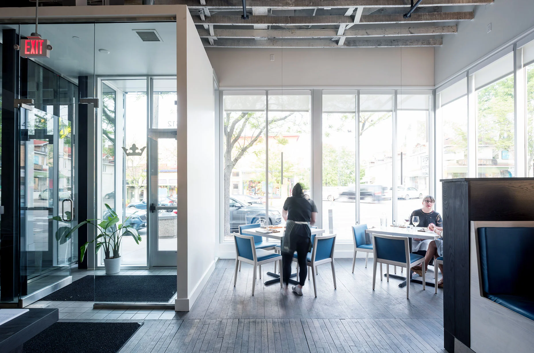 light filled entry and dining area in modern restaurant in minneapolis by christian dean architecture