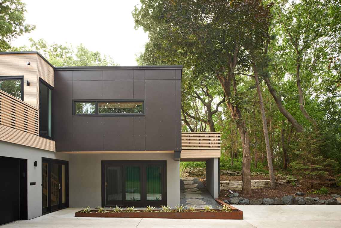 Modern remodel with corten steel, stucco, and wood exterior