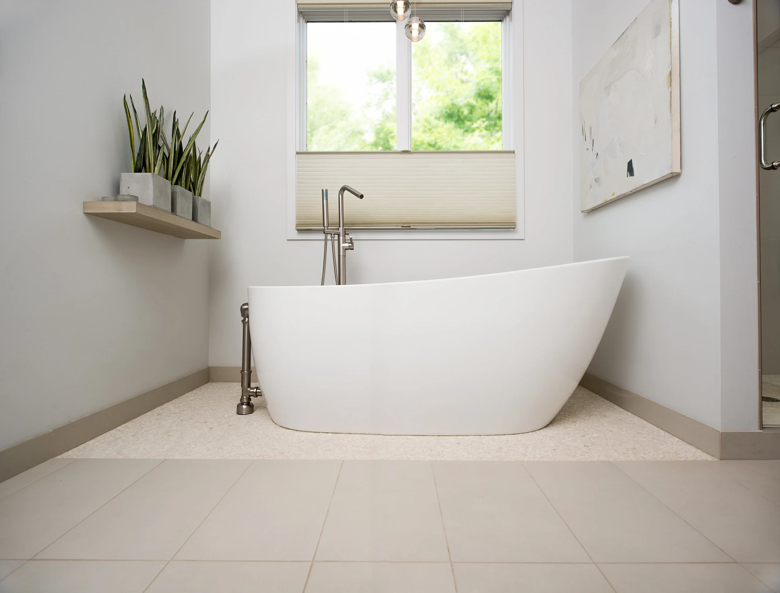 Floating tub in modern master bathroom