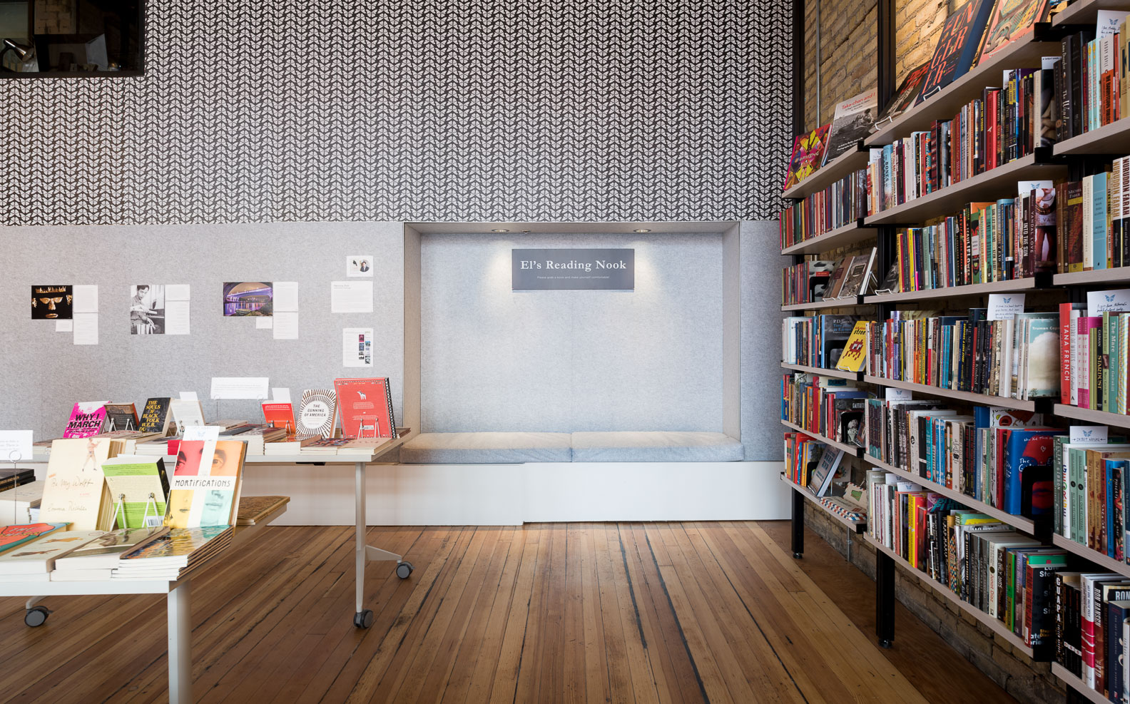 built-in felt reading nook in modern minneapolis bookstore by christian dean architecture