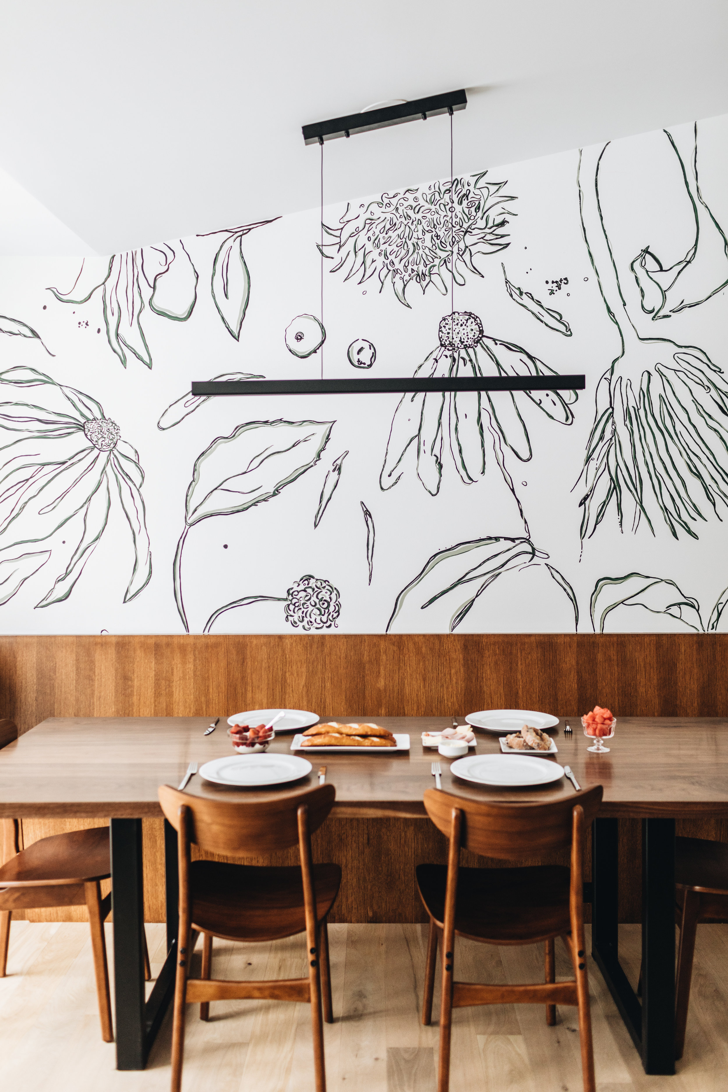 Custom floral wall mural by She She in dining space of St. Louis Park remodel by Christian Dean Architecture.