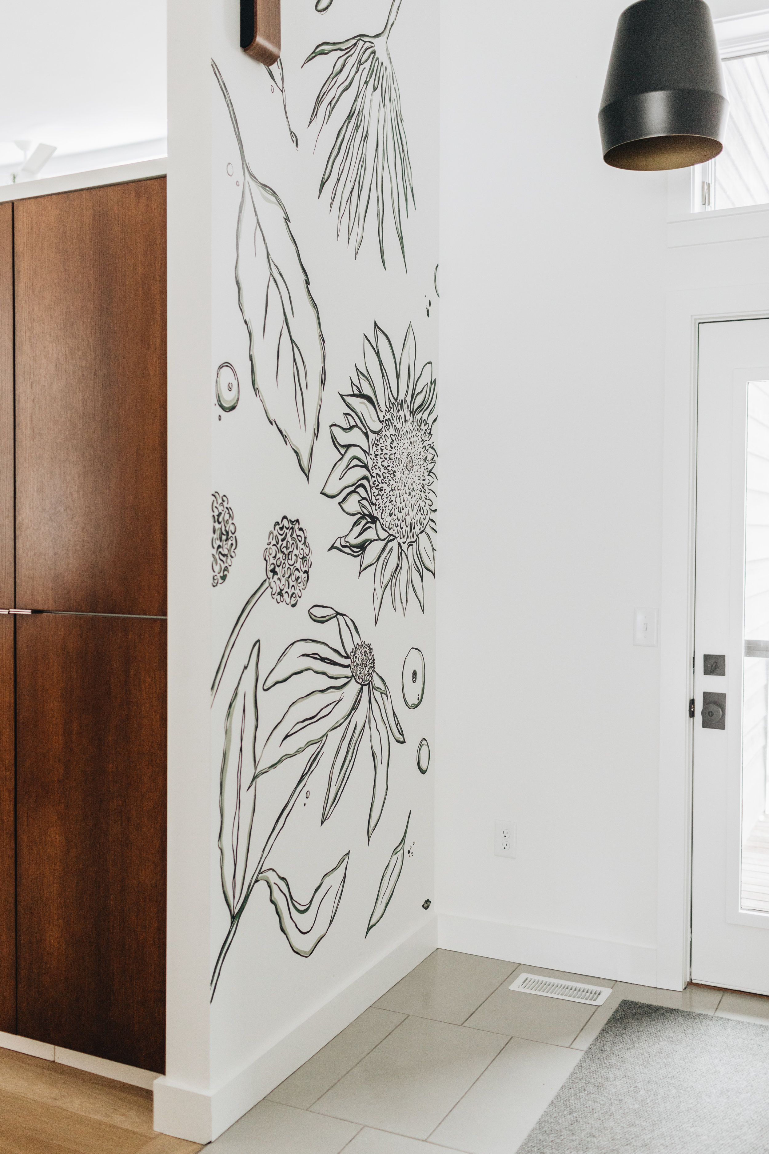 Custom wall mural in entryway of St. Louis Park remodel by Christian Dean Architecture.