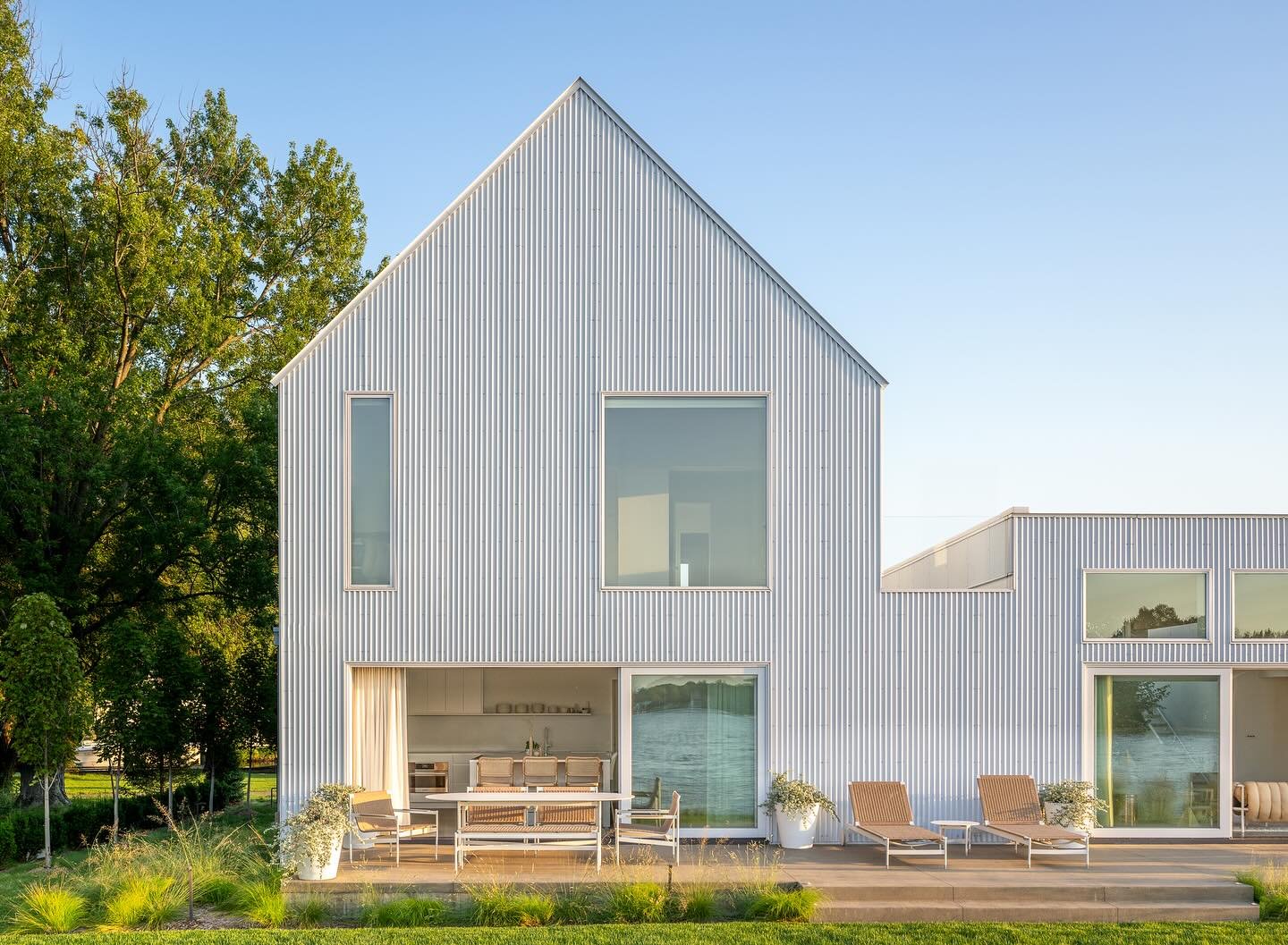 Hard to pick what shots to post of our Lake House on Lake Minnetonka.  See more great pics from @chadholderphoto on our website.  The house was built exactly matching the original &lsquo;U&rsquo; shaped house&rsquo;s foundation but we enclosed and br