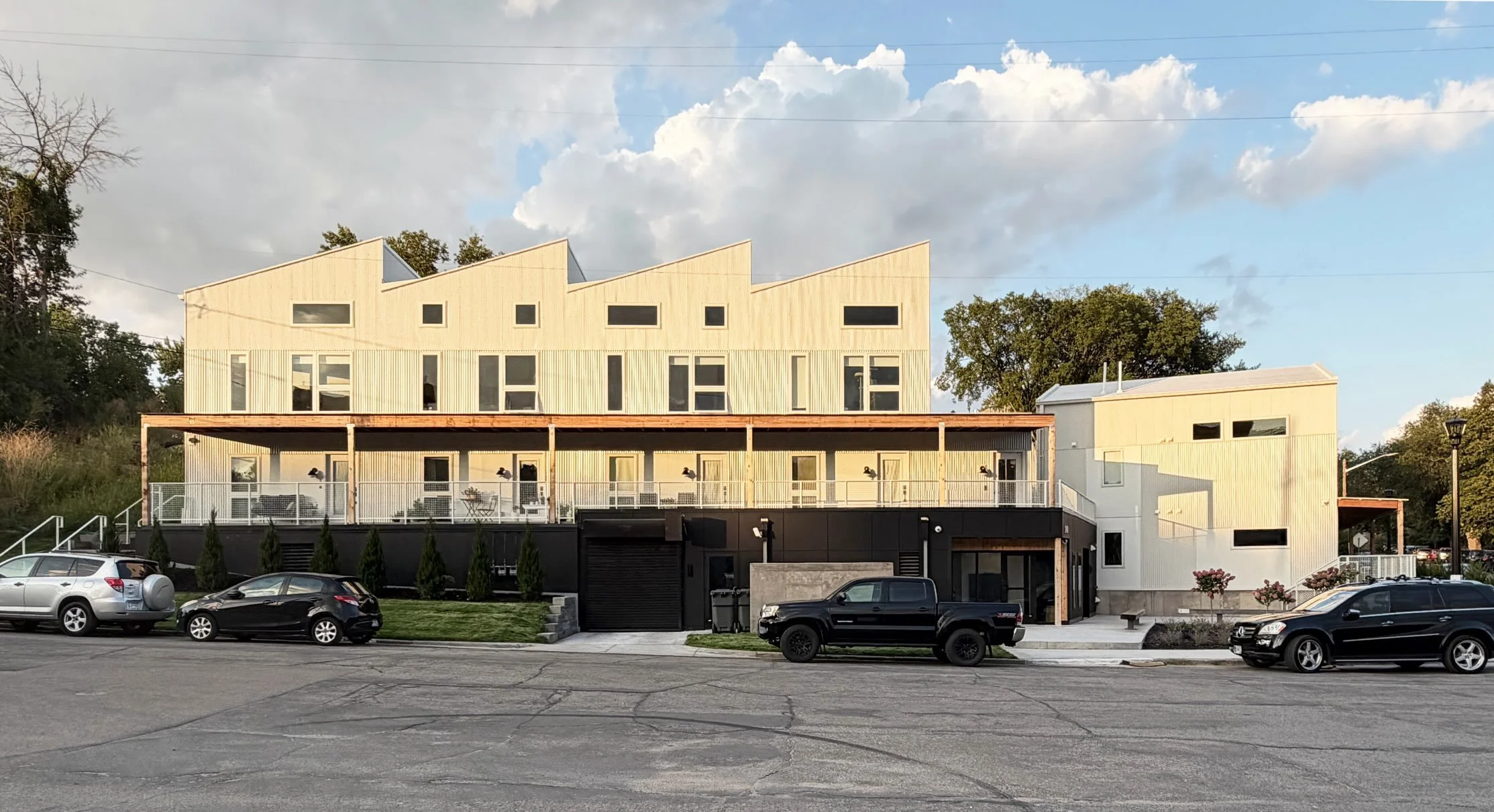 Recently completed design work for our latest multi-family project in the Harrison neighborhood.  A 9-unit apartment building developed on a vacant lot with challenging zoning constraints, bluff and shore land overlay regulations.  Located near Utepi