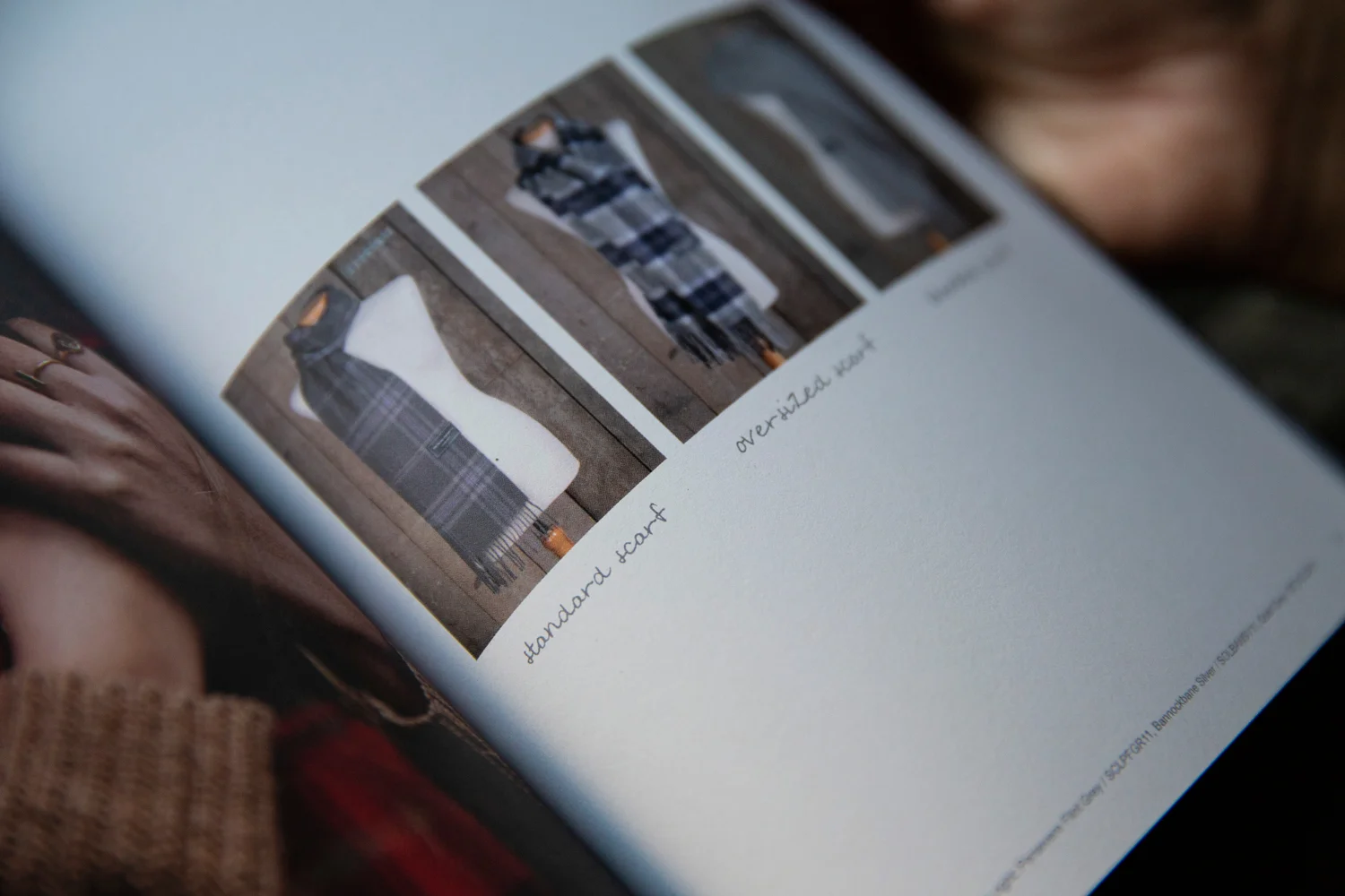  Imagery communicates the various sizing of products, in particular, the multiple sizes of scarves. 