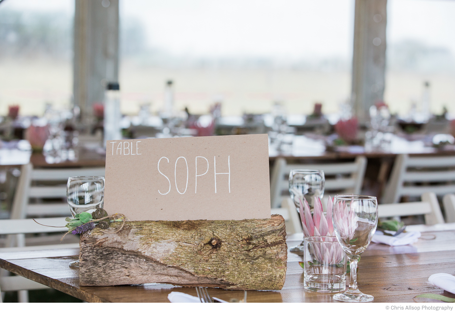  The table signs named after family members were handwritten on recycled stock. 