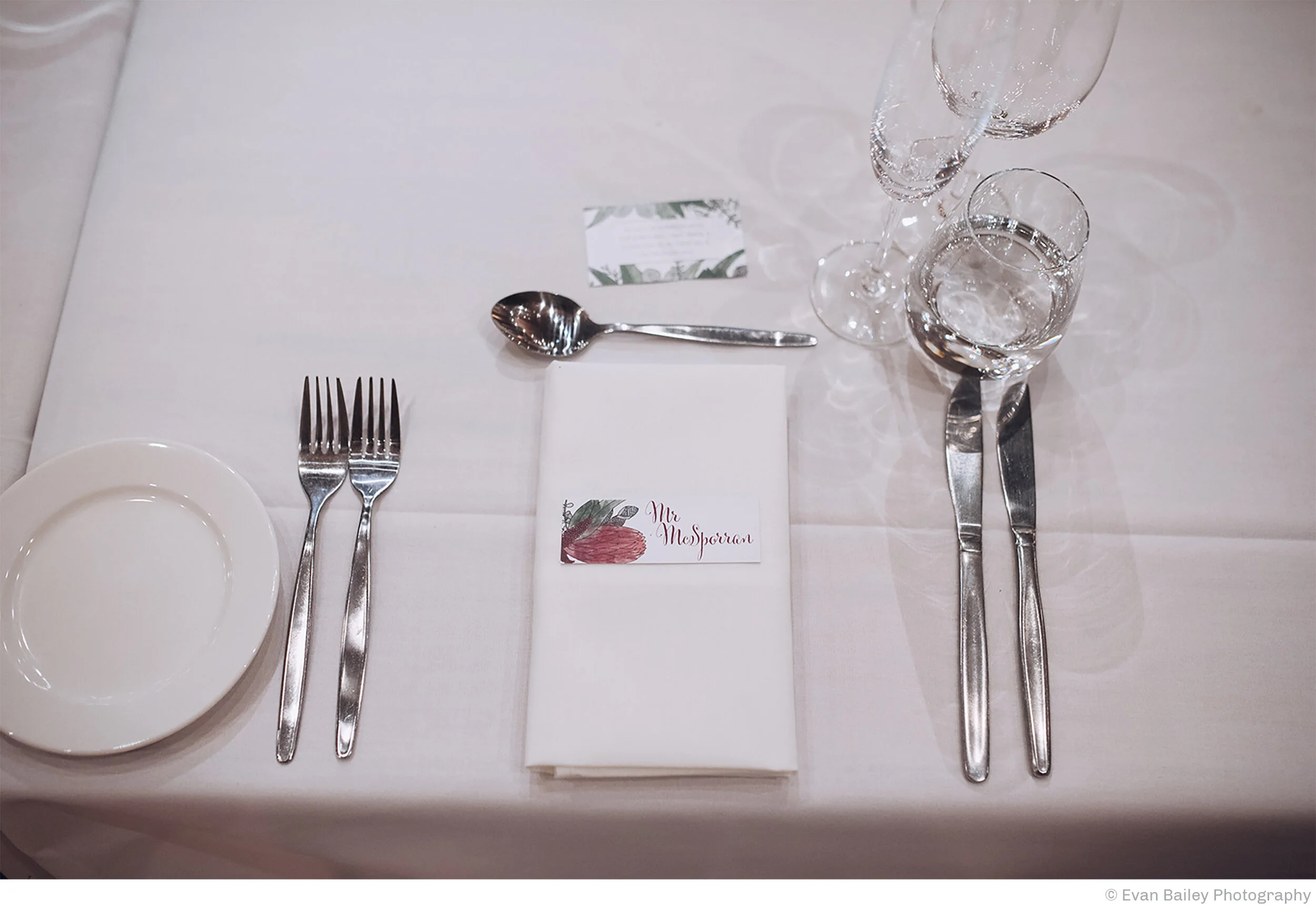  Unique table name tags were designed for each guest. 