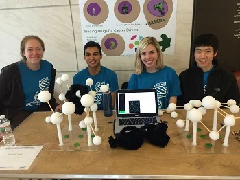 Becky, Dylan, Shelby, and Andrew with a "ring-toss" small molecule microarray.