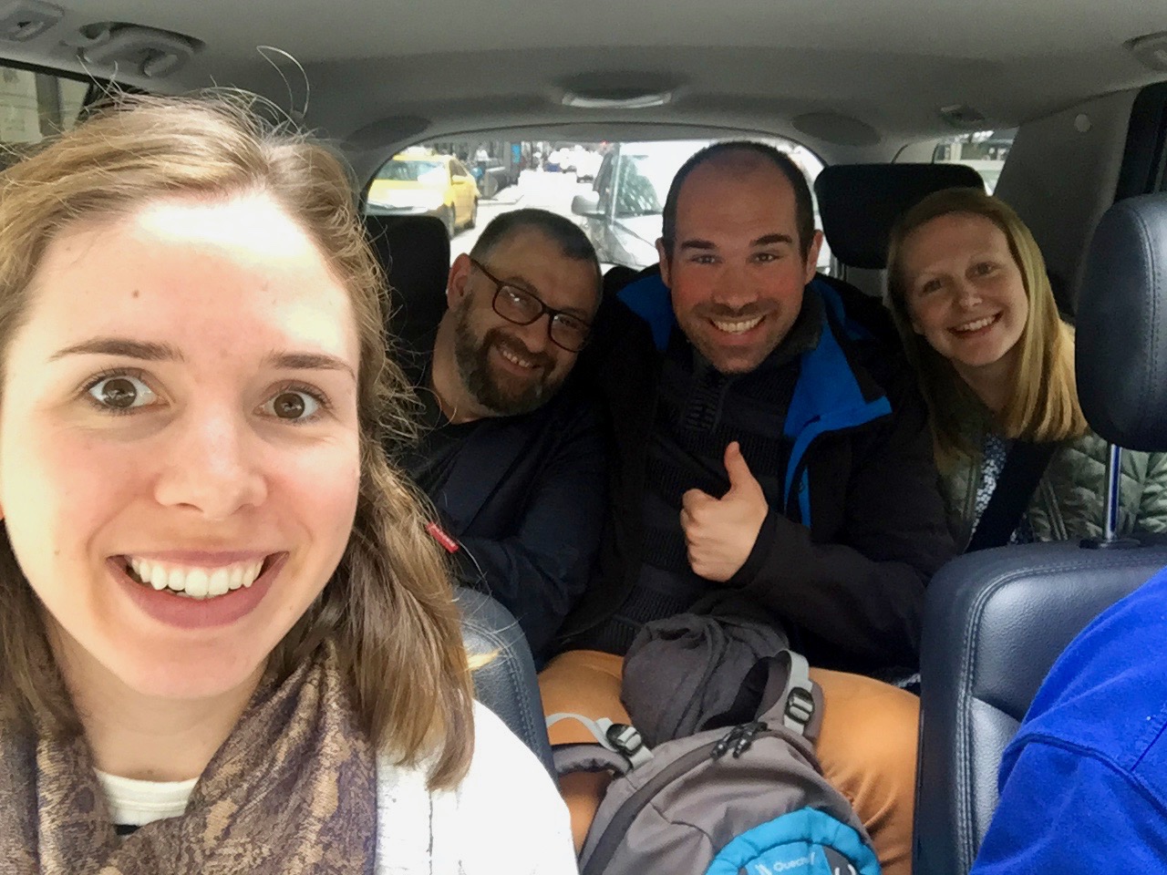 Graduate student Shelby Doyle with former Koehler Lab research scientist Marius Pop and postdoc's André Richters and Helen Evans taking a Cab into town between sessions.