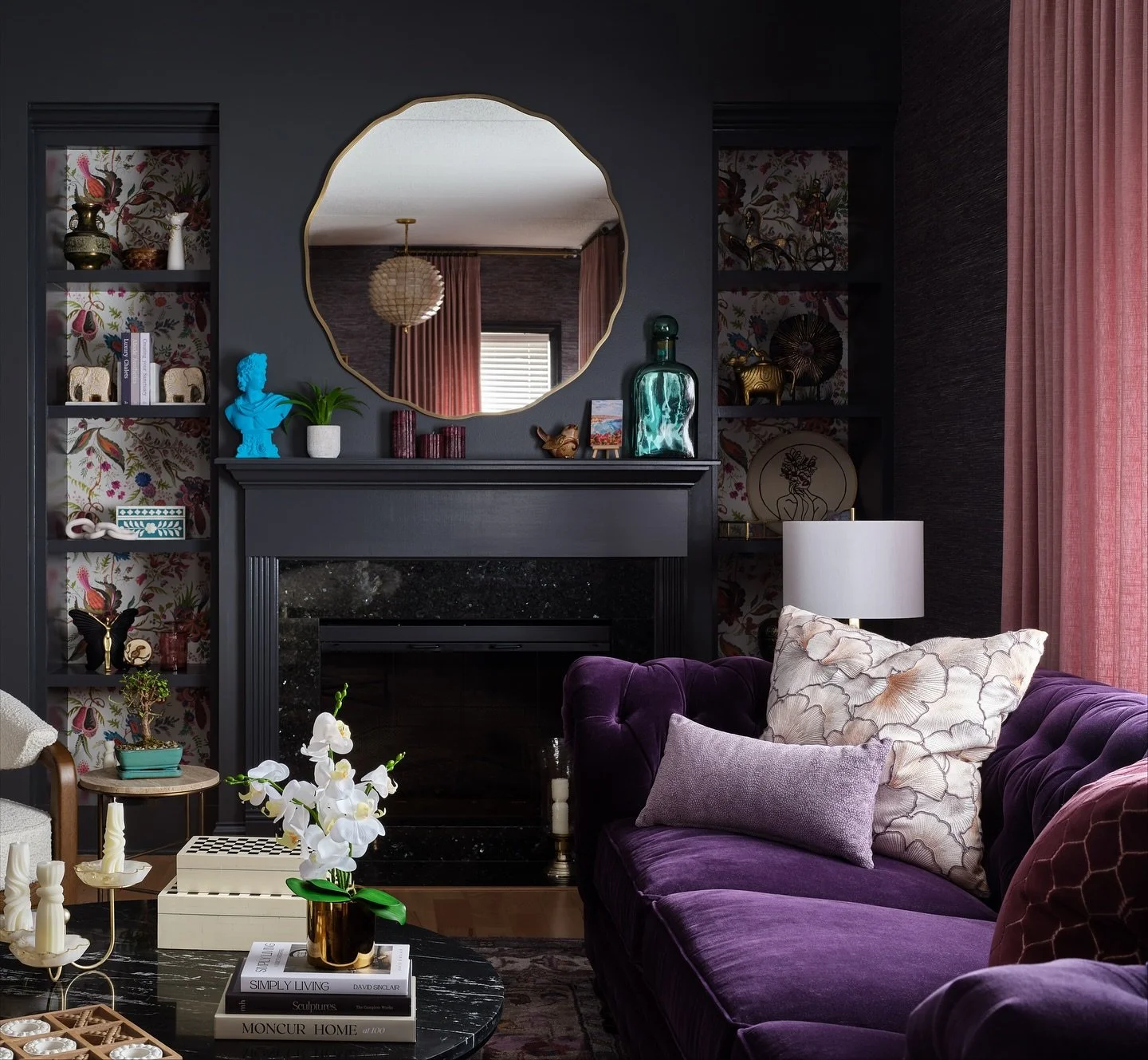 This moody living room embraces rich purple tones, dramatic black walls, and layers of texture that create an inviting sense of depth &spades;️💜

Swipe for the before! 
📸 @dustinforest