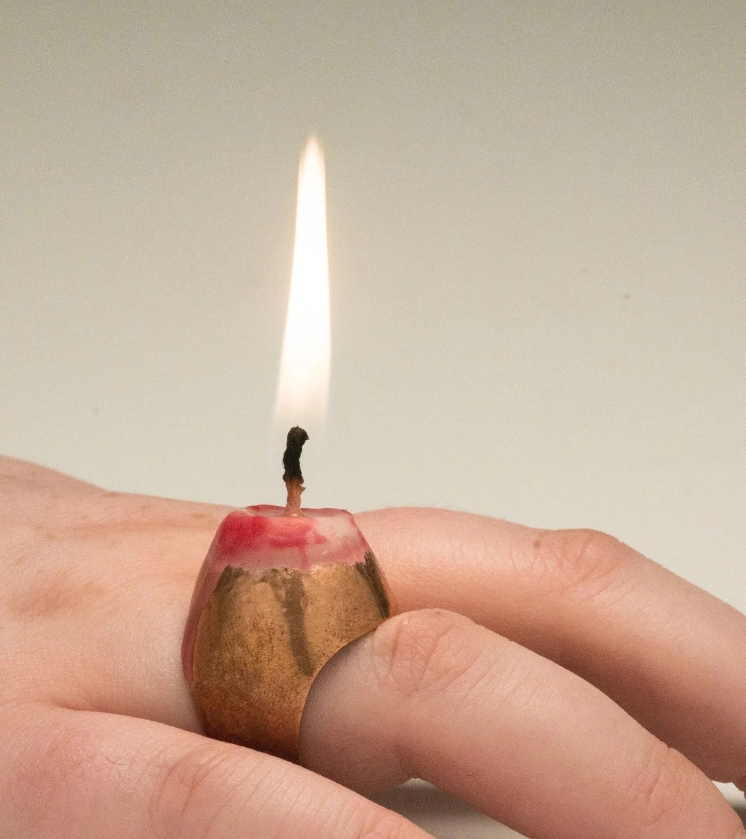Linore Huss , Love Will Light the Way , 2017 Copper formed and soldered ring, set wax candle 1.5 x 1 x 0.8 inches Photo courtesy of the artist