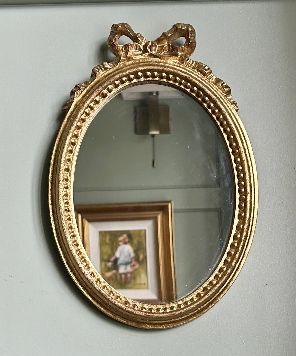 Pair of Small Oval Italian Decorative Mirrors