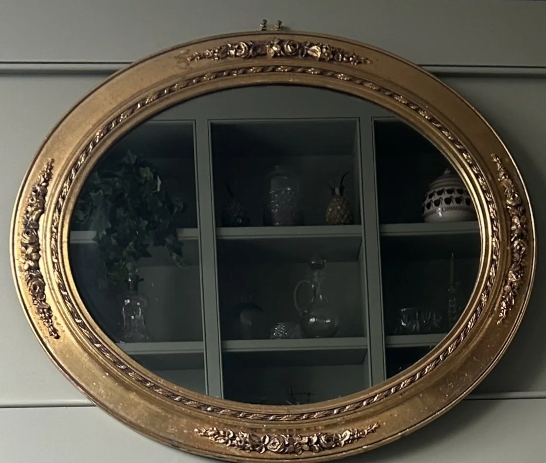 Pair of Oval Giltwood Mirrors