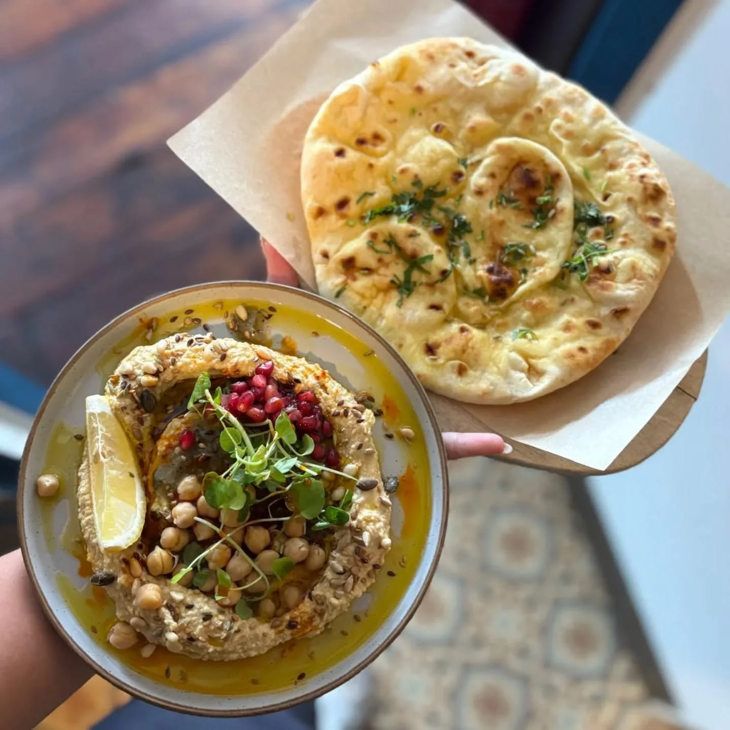 House hummus is always a good idea... Breakfast ,brunch or lunch!

Whipped lemon hummus with chickpeas and rose harrisa oil, flatbread