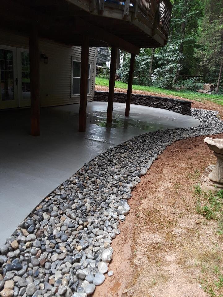 Concrete Patio with Fieldstone Seatwall and Delaware Stone.jpeg