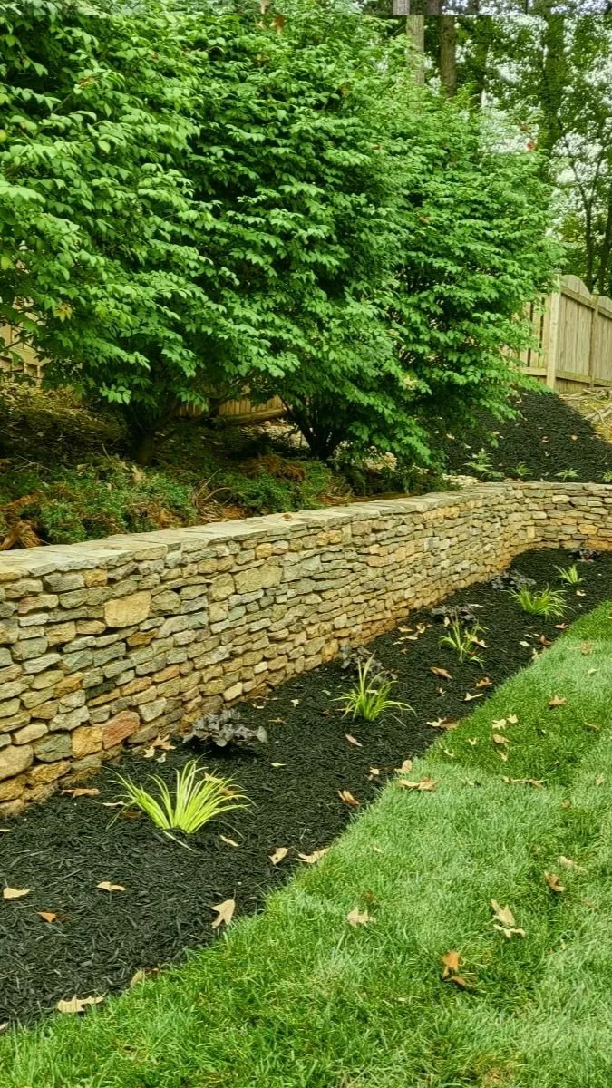 Stone Wall with Garden and Trees