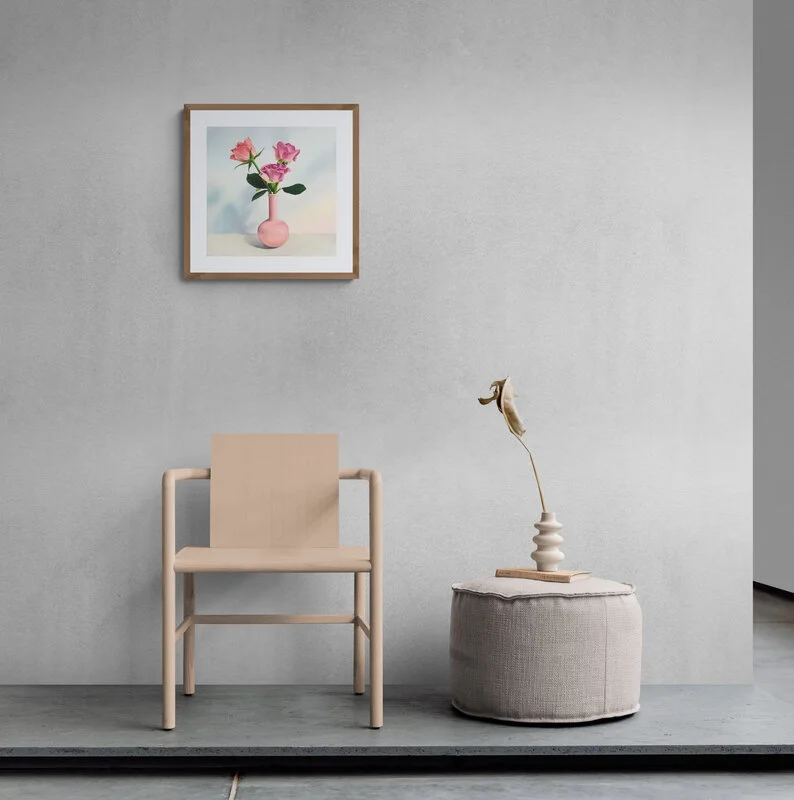 Chair_and_pouf_sitting_on_concrete_slab.jpg