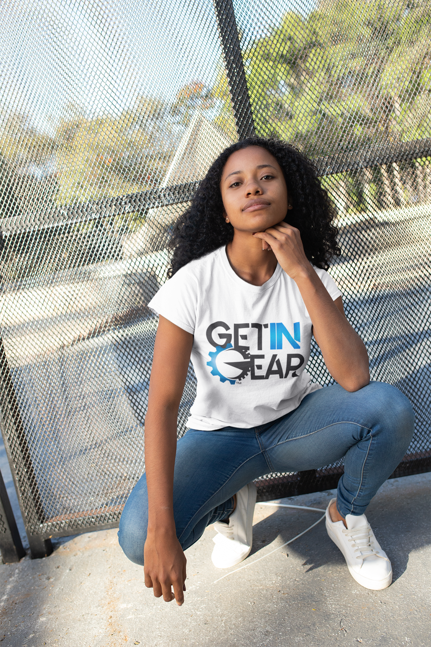 tshirt-mockup-of-a-girl-with-curly-hair-crouching-24095.png
