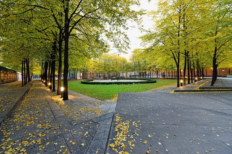 Tree lined walkways of Trinity square, a park adjacent to the property