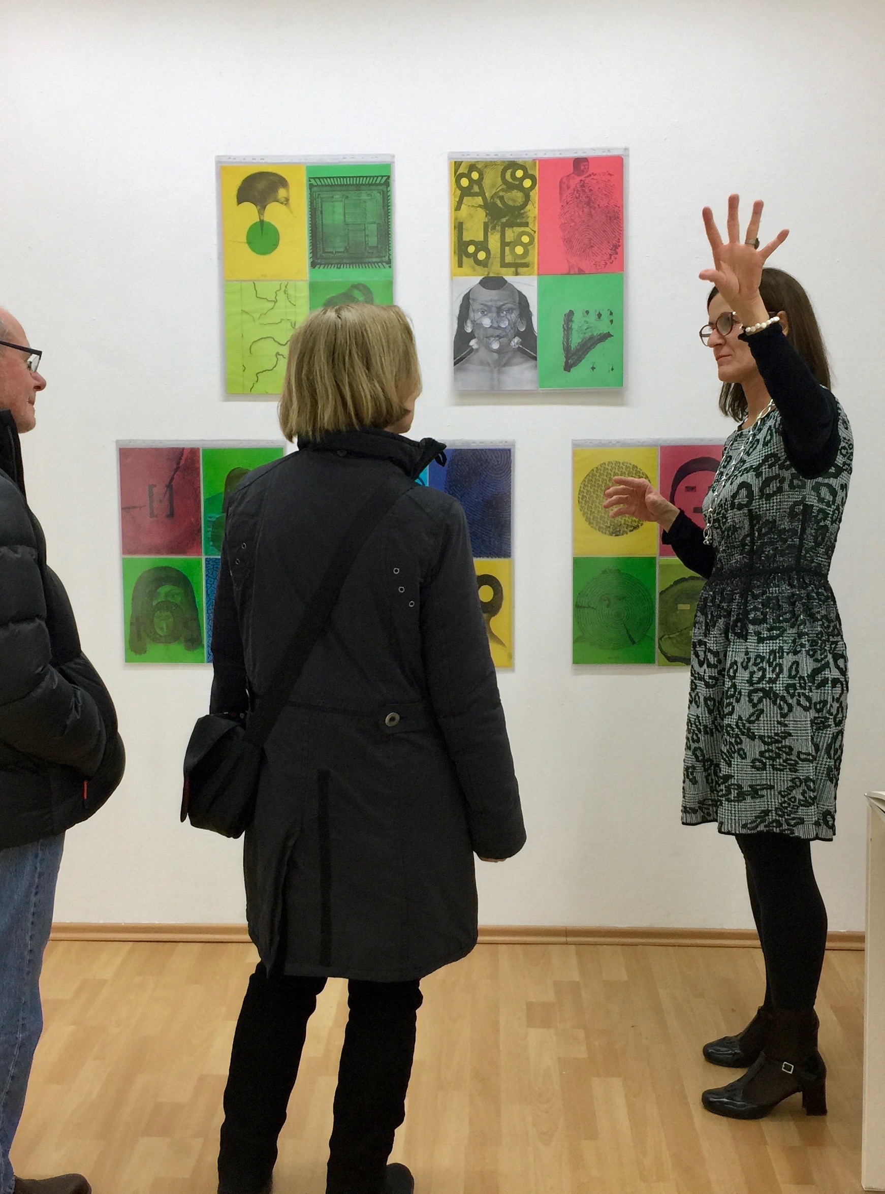Curator Martina Merklinger showing the works of Cristina Barroso