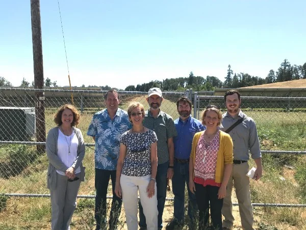Janine Benner, ODOE director, and Robin Freeman, ODOE's government relations manager, gathered with Representatives Paul Holvey and Nancy Nathanson and her staff member James Ellsworth, Senator Floyd Prozanski, and Lane Electric general manager Matt Michel outside of Eugene last week to tour a solar project in Lane Electric's service area. 
