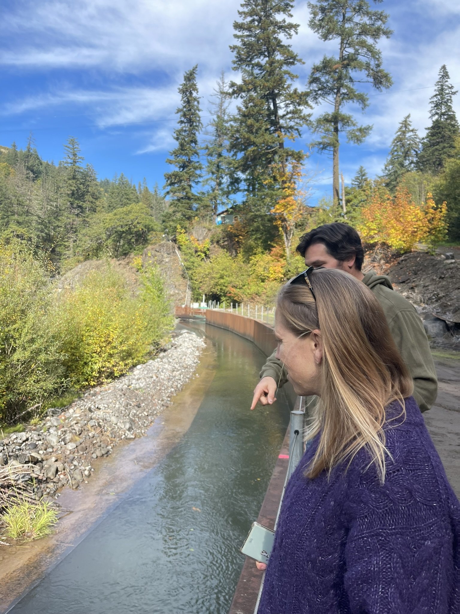  Les Perkins shows Mid-Columbia Economic Development District’s Lindsay McClure the Farmers Irrigation District’s operations on the Hood River. 