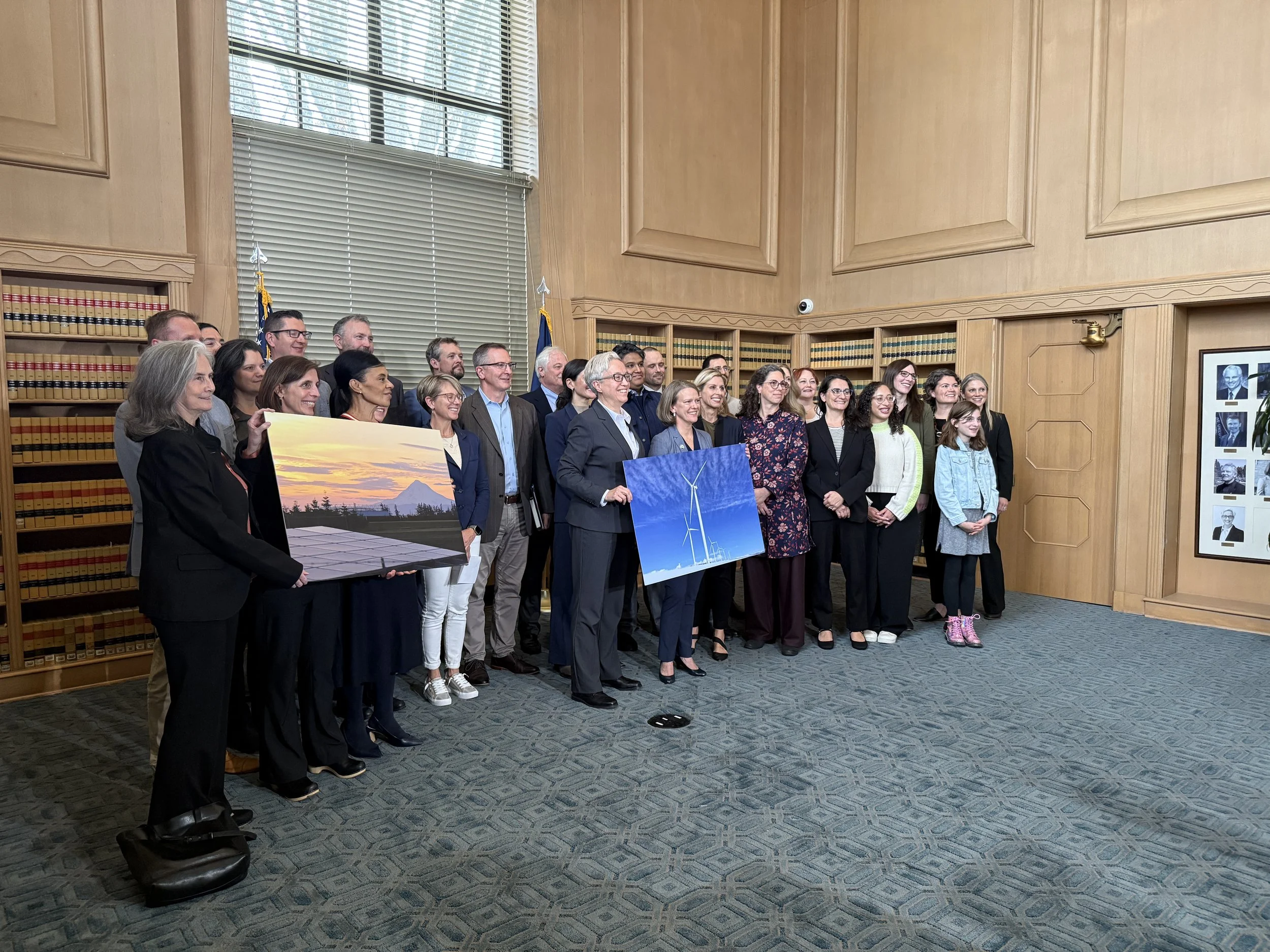 Group gathers to celebrate the new executive order.