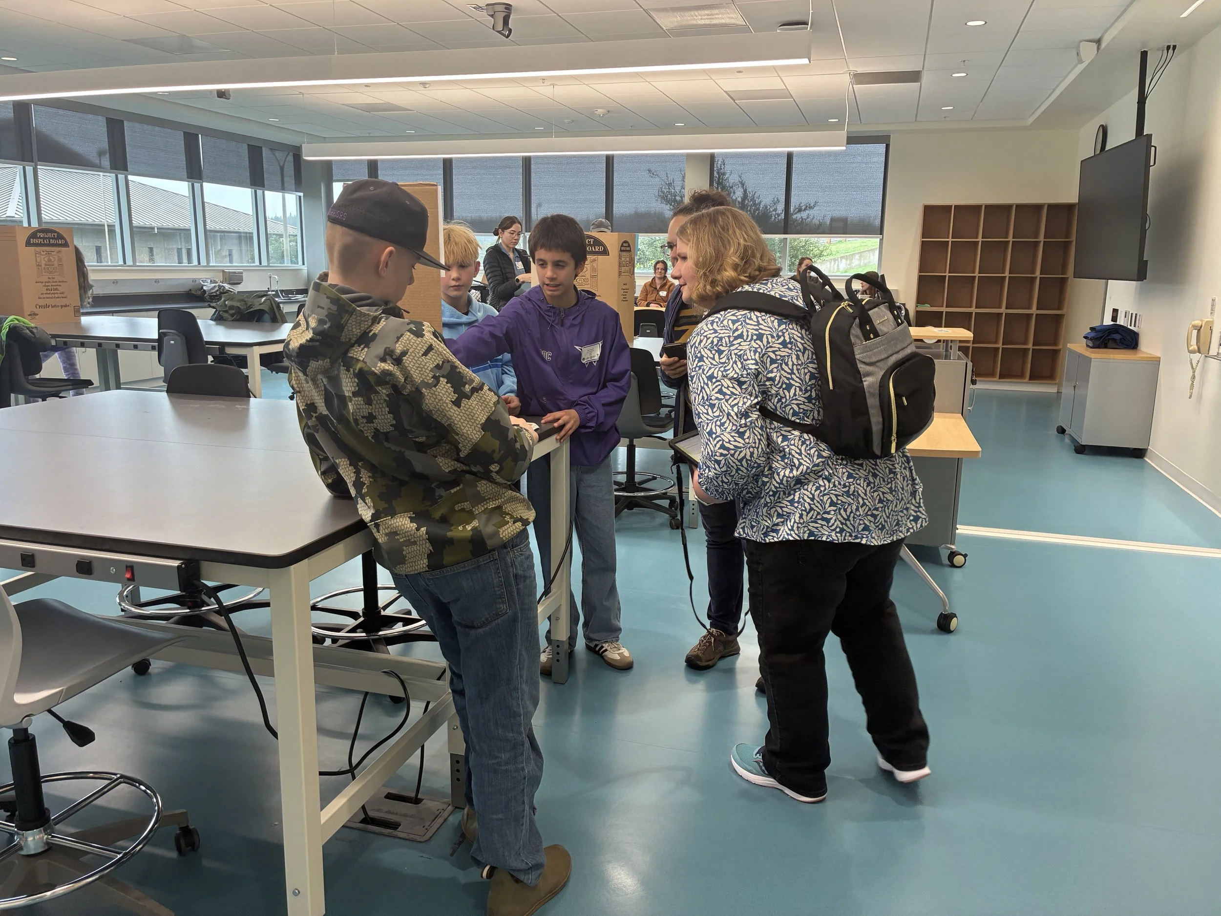 ODOE Communications Director Jenny Kalez asks questions about a solar project.