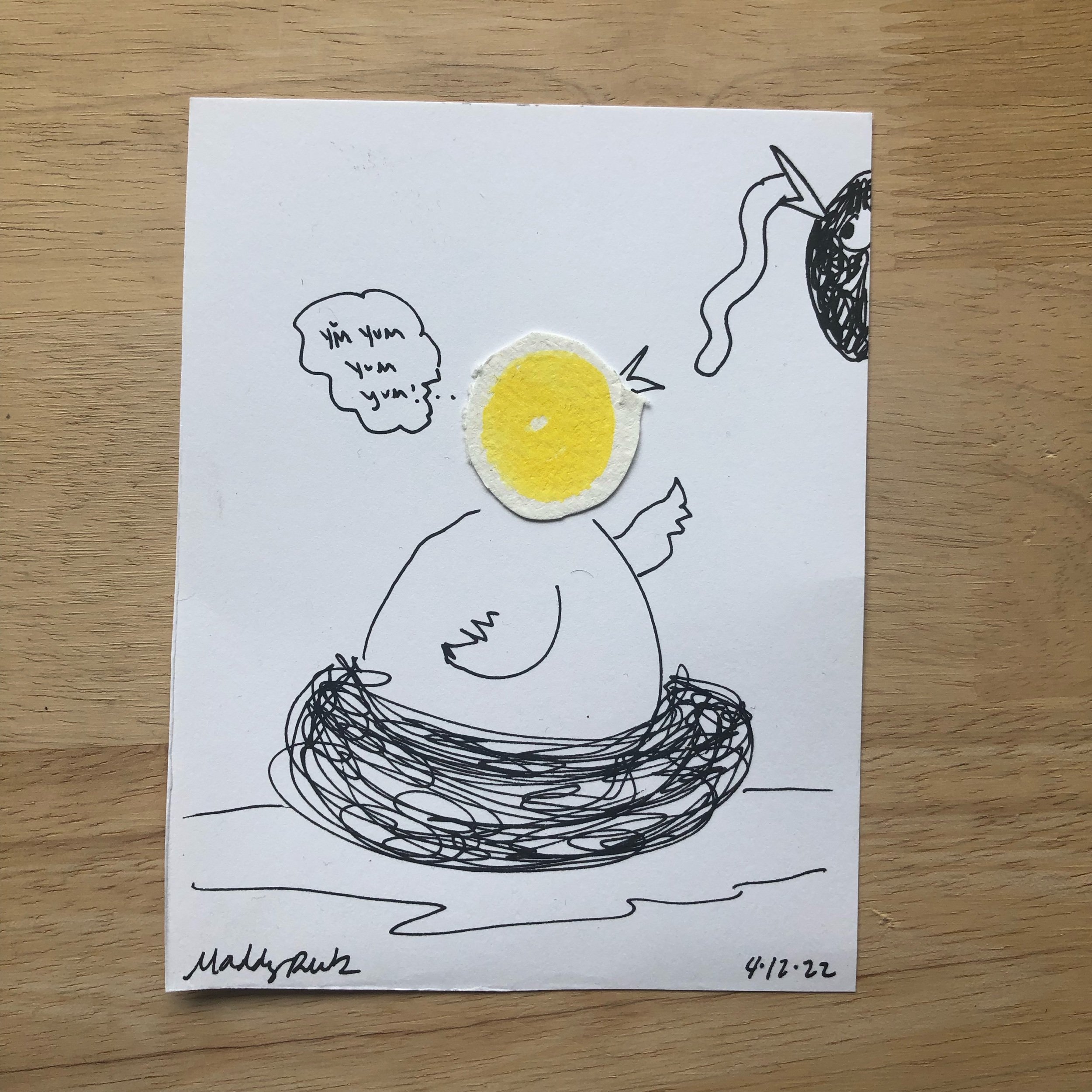  100 Day Project illustration that uses ink and yellow painted watercolor paper blob. Illustration shows a baby bird in a nest, eating a worm.  
