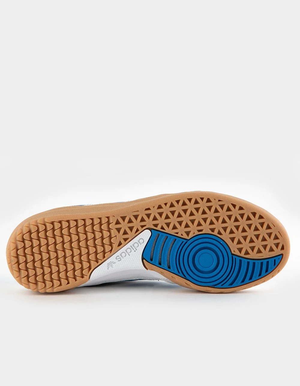 A sneaker sole featuring a gum rubber outsole with a blue accent, wear pattern, and the Adidas logo.