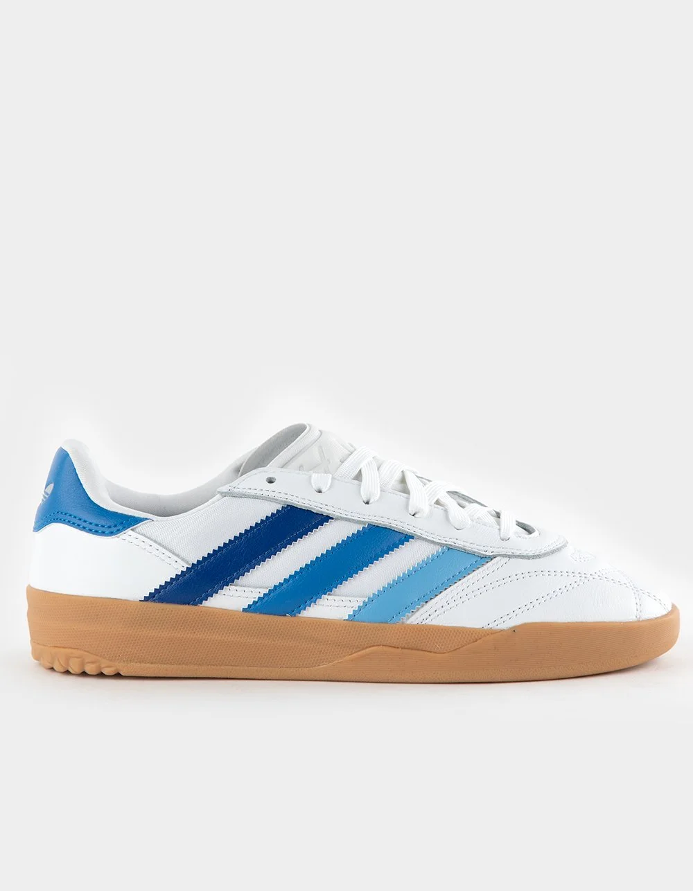 White sneaker with blue stripes and a gum sole, side view.
